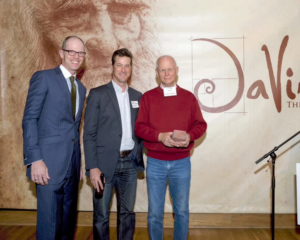 Bill Haw (right) takes home a Brick-by-Brick award from KCIC for his new high-end apartment project in the Stockyards District.