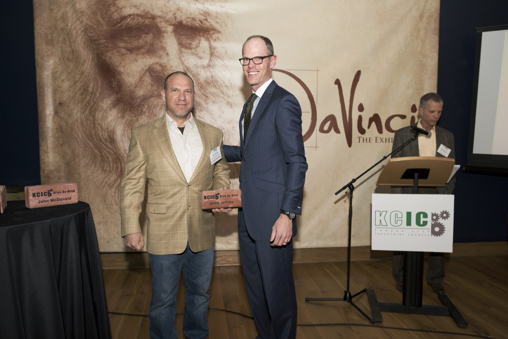 Jamie Jeffries (left) accepts KCIC’s award for his and John McDonald’s contributions to the East Bottoms.