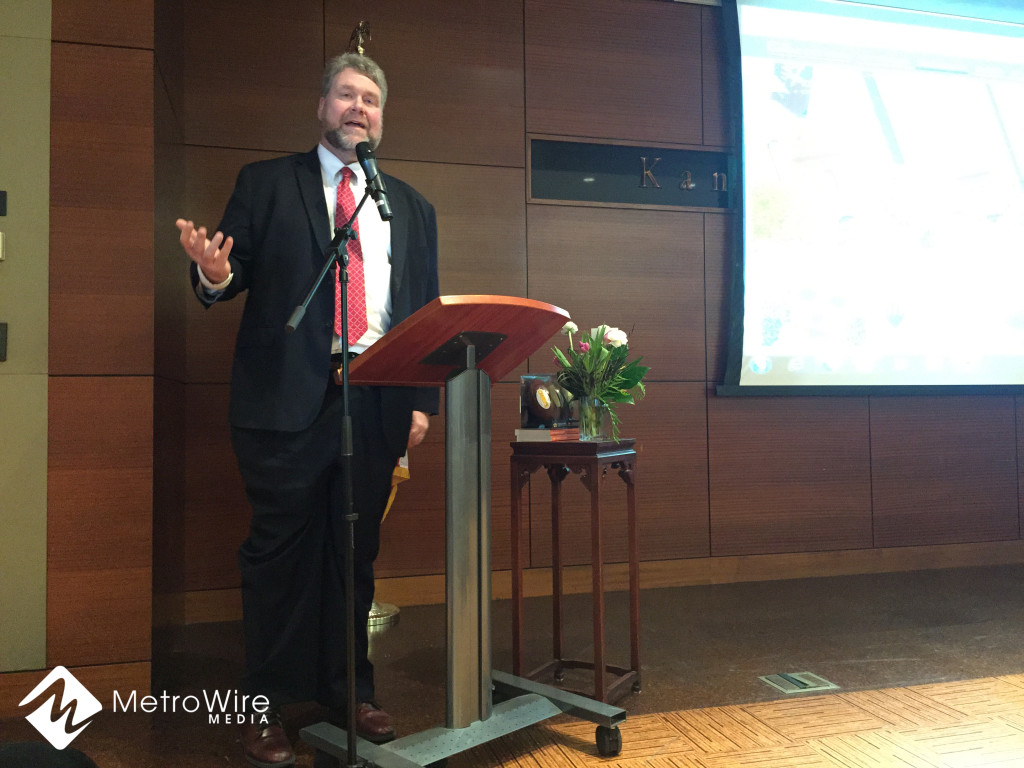 Troy Schulte, city manager of Kansas City, addresses the KC Downtowners on Wednesday.