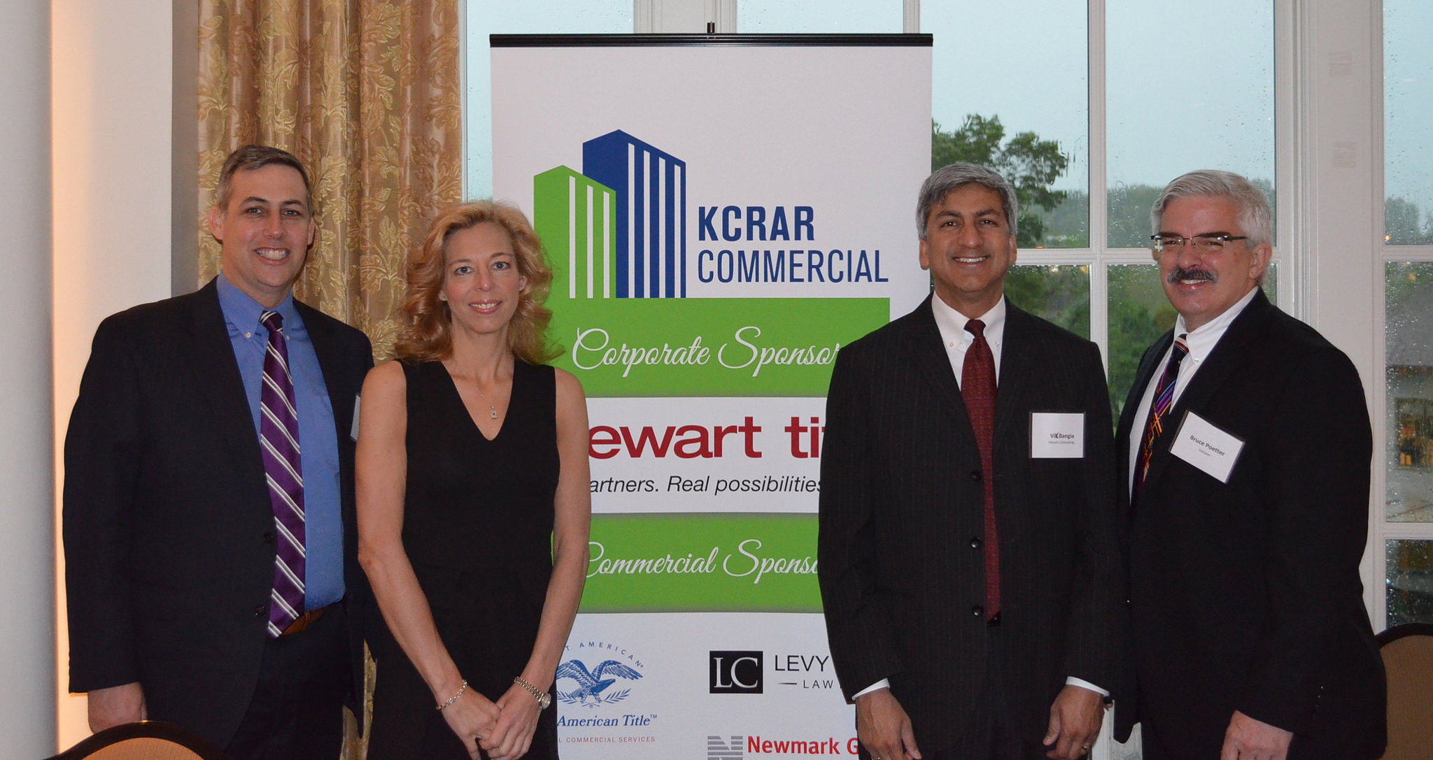 Bill Early, Copaken Brooks; Tina Itschner, HNTB; Vik Bangia, Verum Consulting; and Bruce Poetter, Verizon.