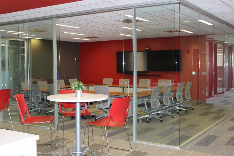 A glass-walled conference room in the center of the floor is equipped with all the latest audio/visual conferencing technology and is soundproofed to allow for private meetings.