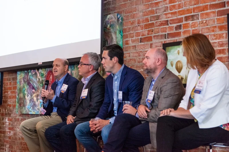 The workplace design panel, left to right: Jon Copaken of Copaken Brooks, Gerald Smith of Plexpod, Terry Anderson of Mariner Real Estate, Richard Wetzel of Centric Projects, and Shelley Rosetta of encompas. Architectural Photography by Jacia Phillips