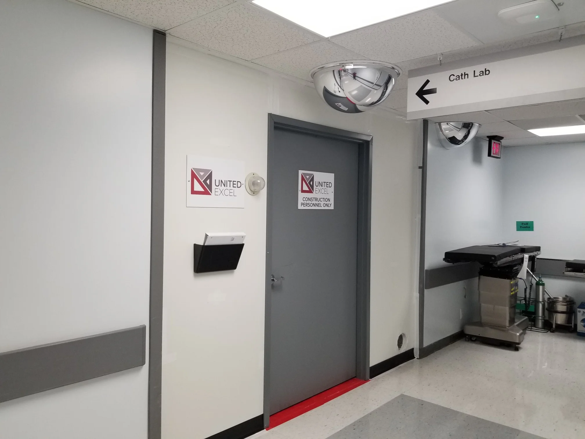 United Excel built an actual infection control barrier during construction of Shawnee Mission Medical Center's Hybrid OR. The wall blends visually into the adjacent hallway.