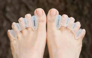 (These are not my feet; I just wanted to show you what Correct Toes look like. Check out the user manual for all the deets.)