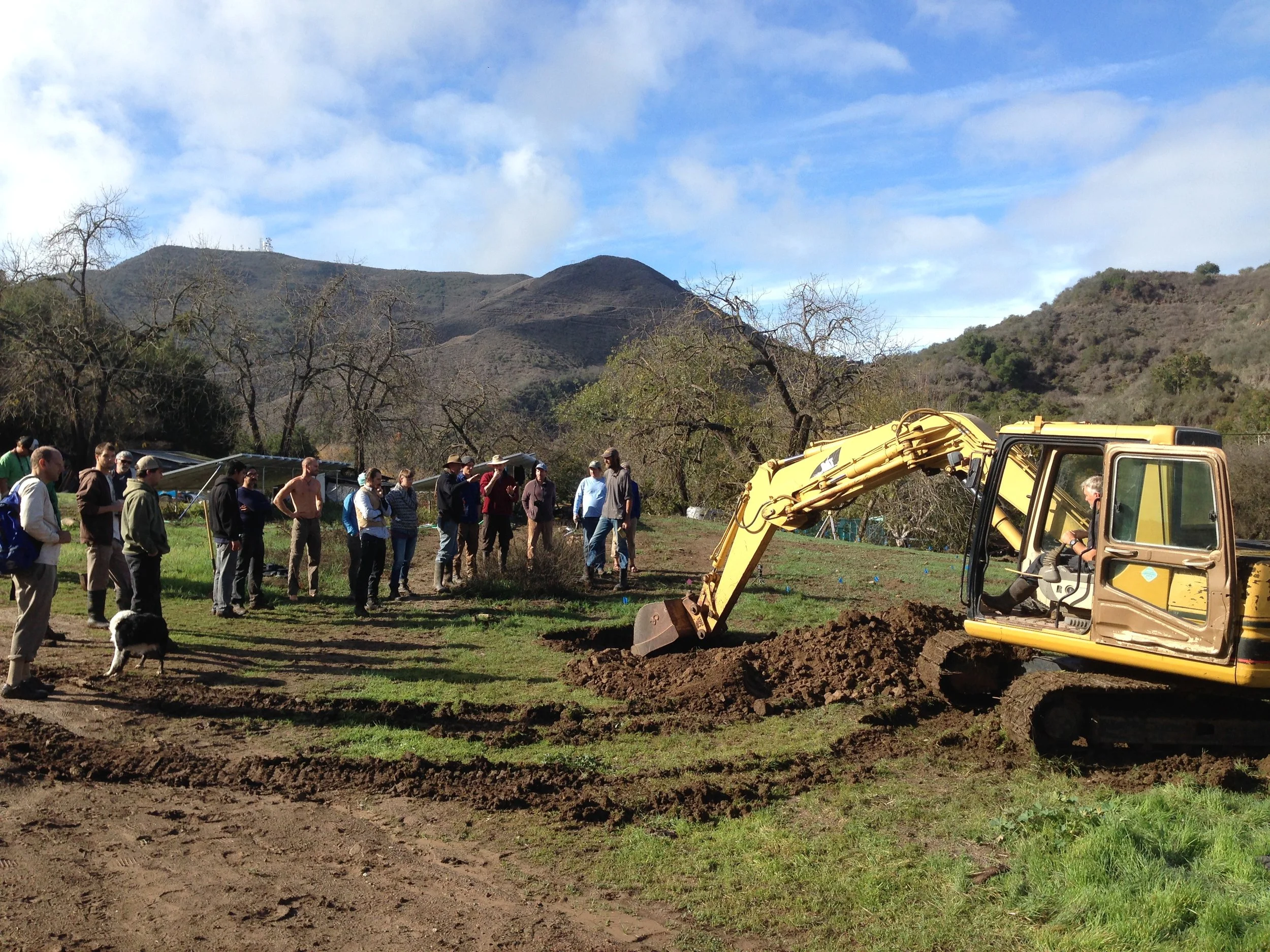 Digging Drainage into Top Swale.jpg
