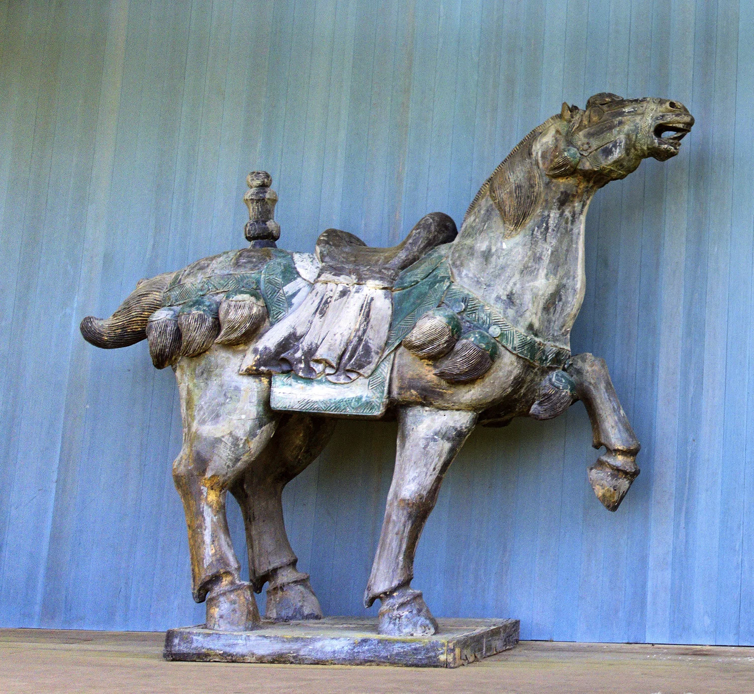 Life size wooden war horse by our front door