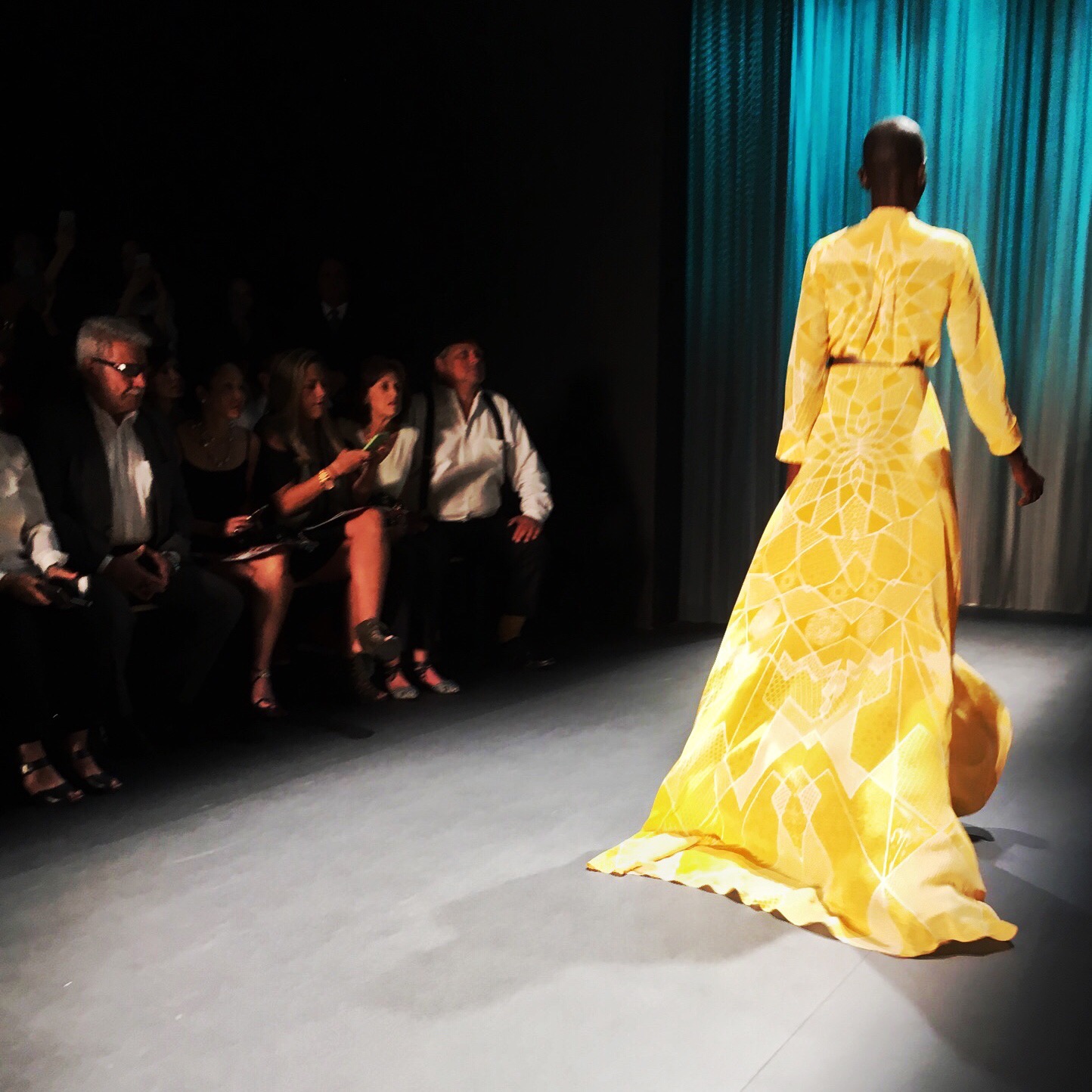 A gold Oday Shakar gown from the back.