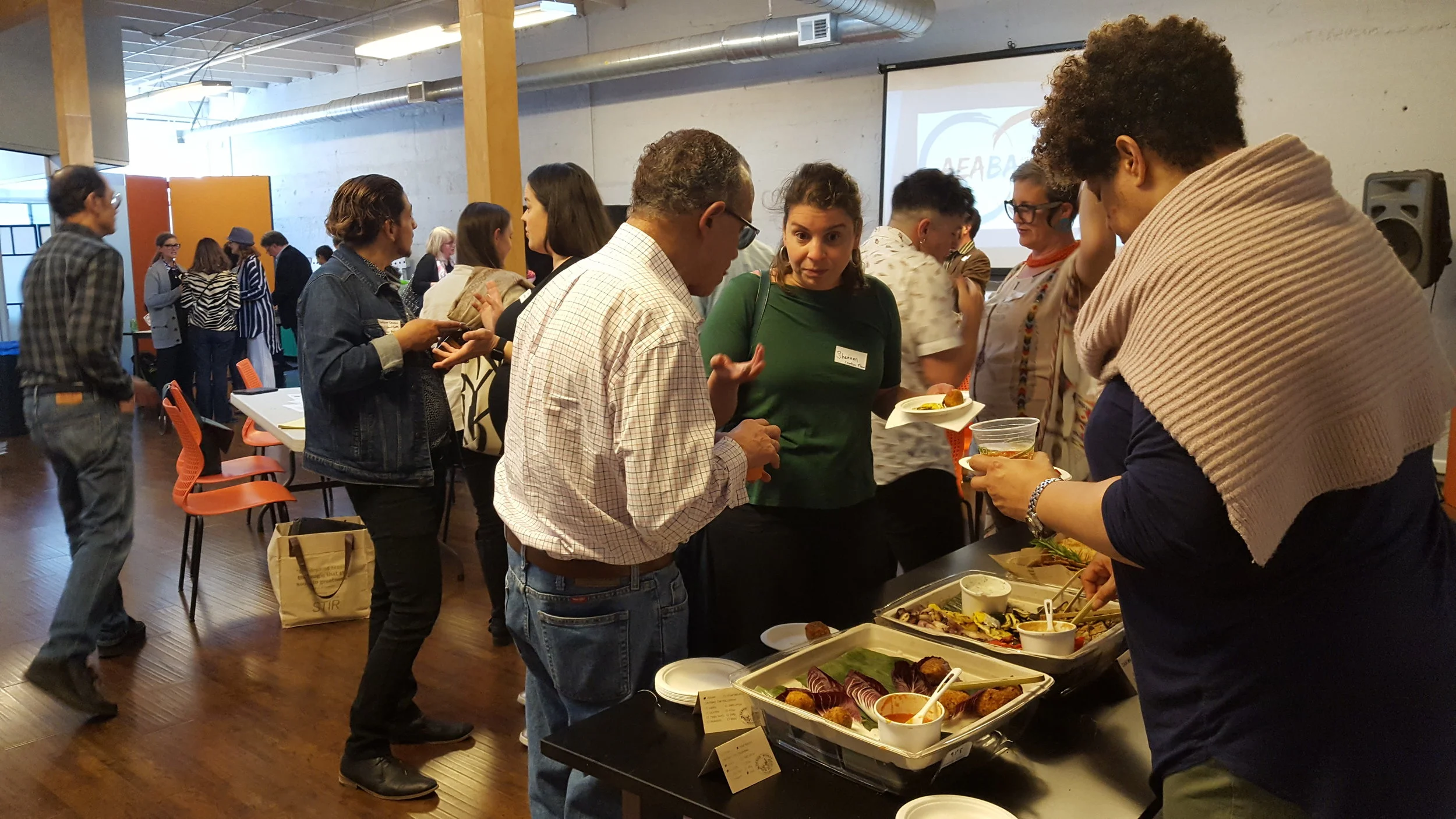 Making connections and conversation over fancy snacks