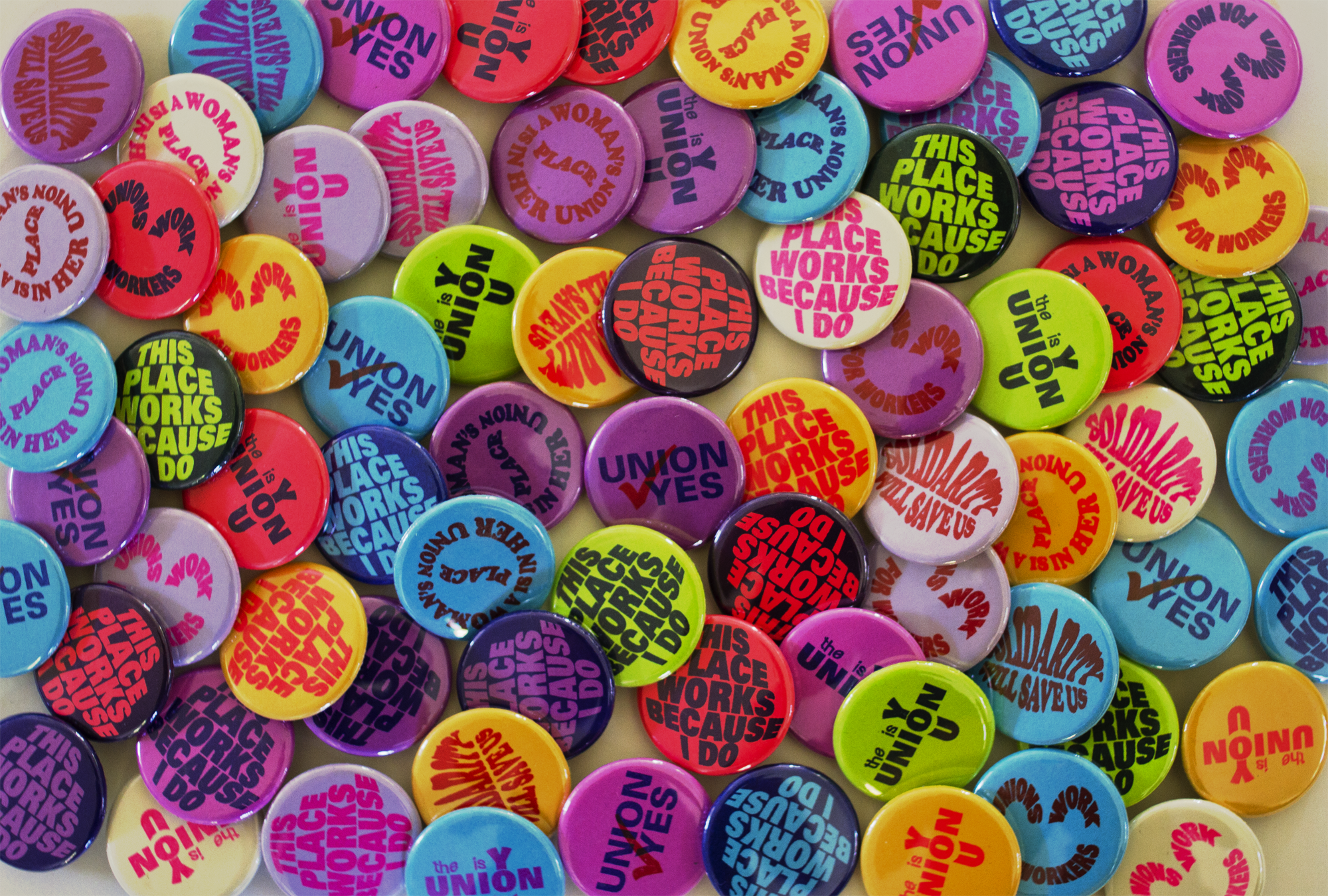Handmade, pro-union buttons distributed at the event. Photo Credit: Jessalyn Aaland