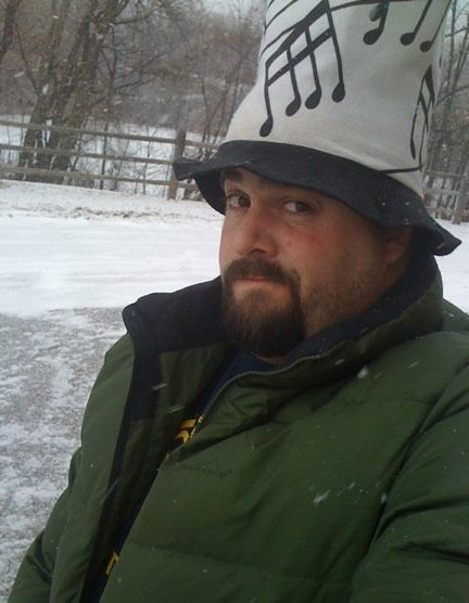 Sam Bass often likes to where his music hat to remind himself that he is a teacher first.