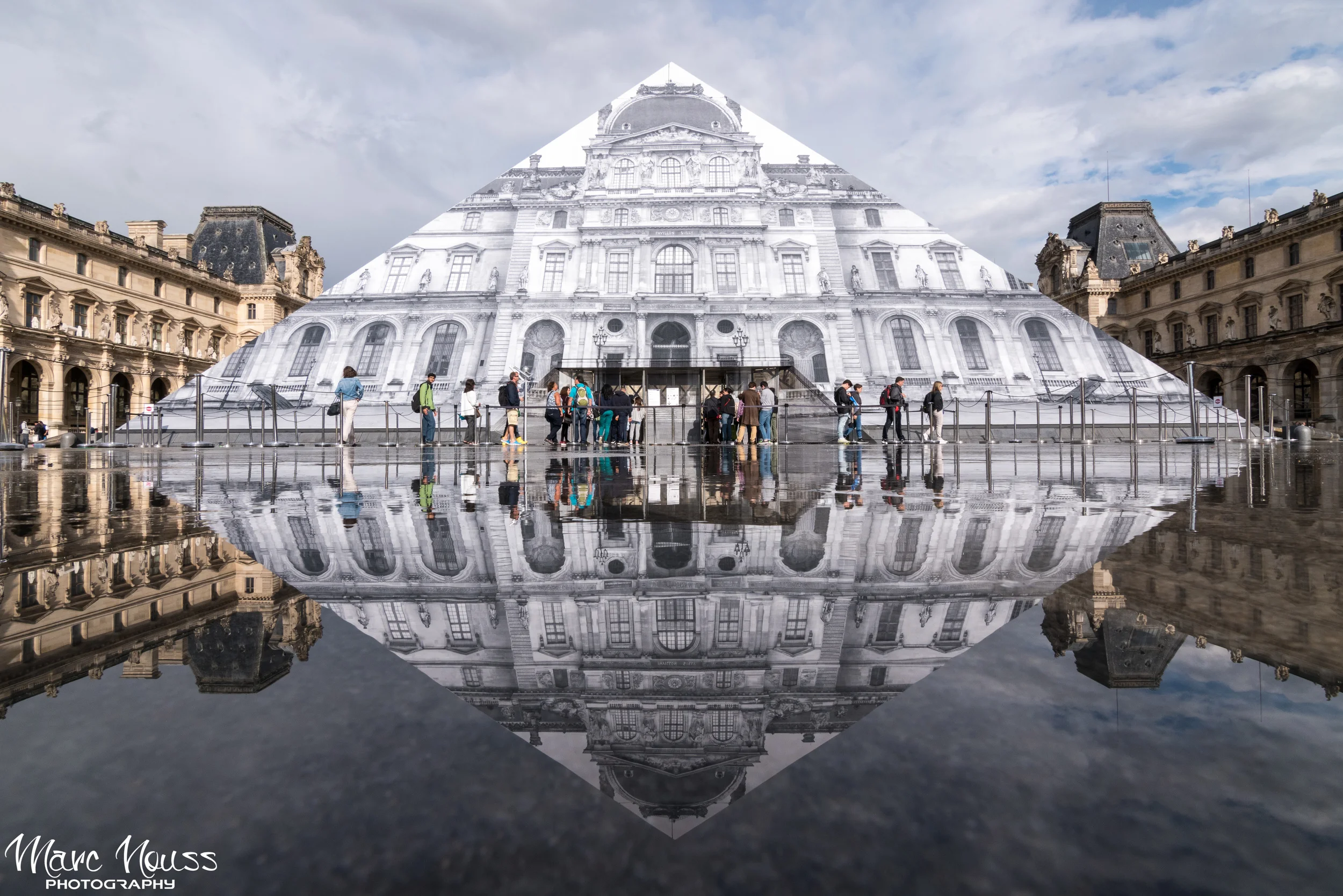 JR art work at Louvre Pyramide