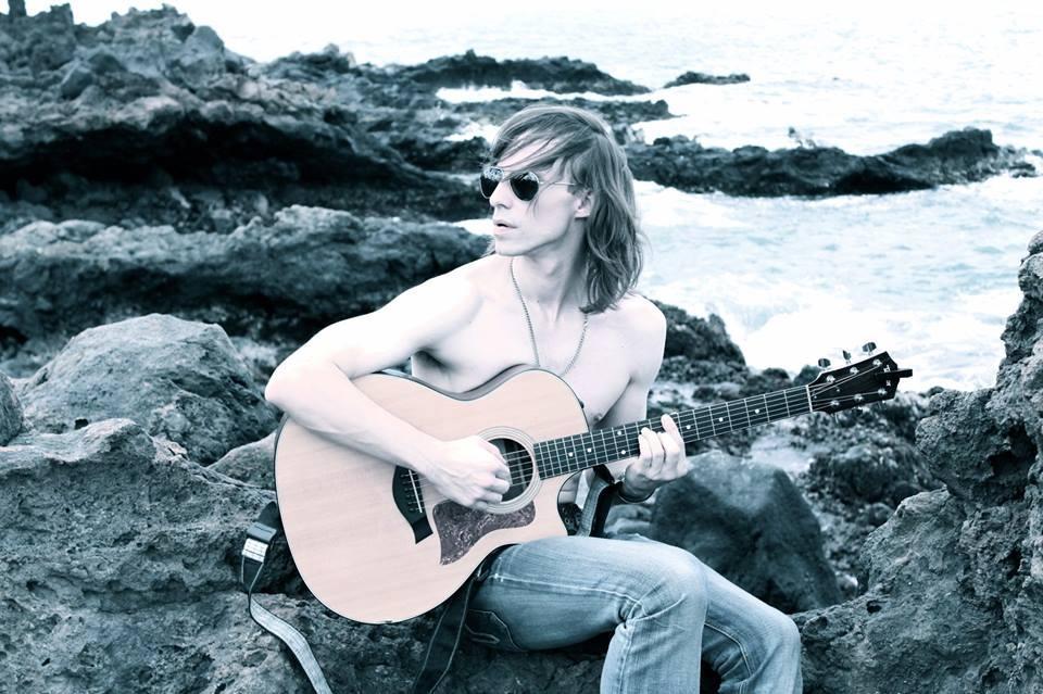 The Sonic Universe, a.k.a. Alex Arndt by the ocean with his Taylor guitar