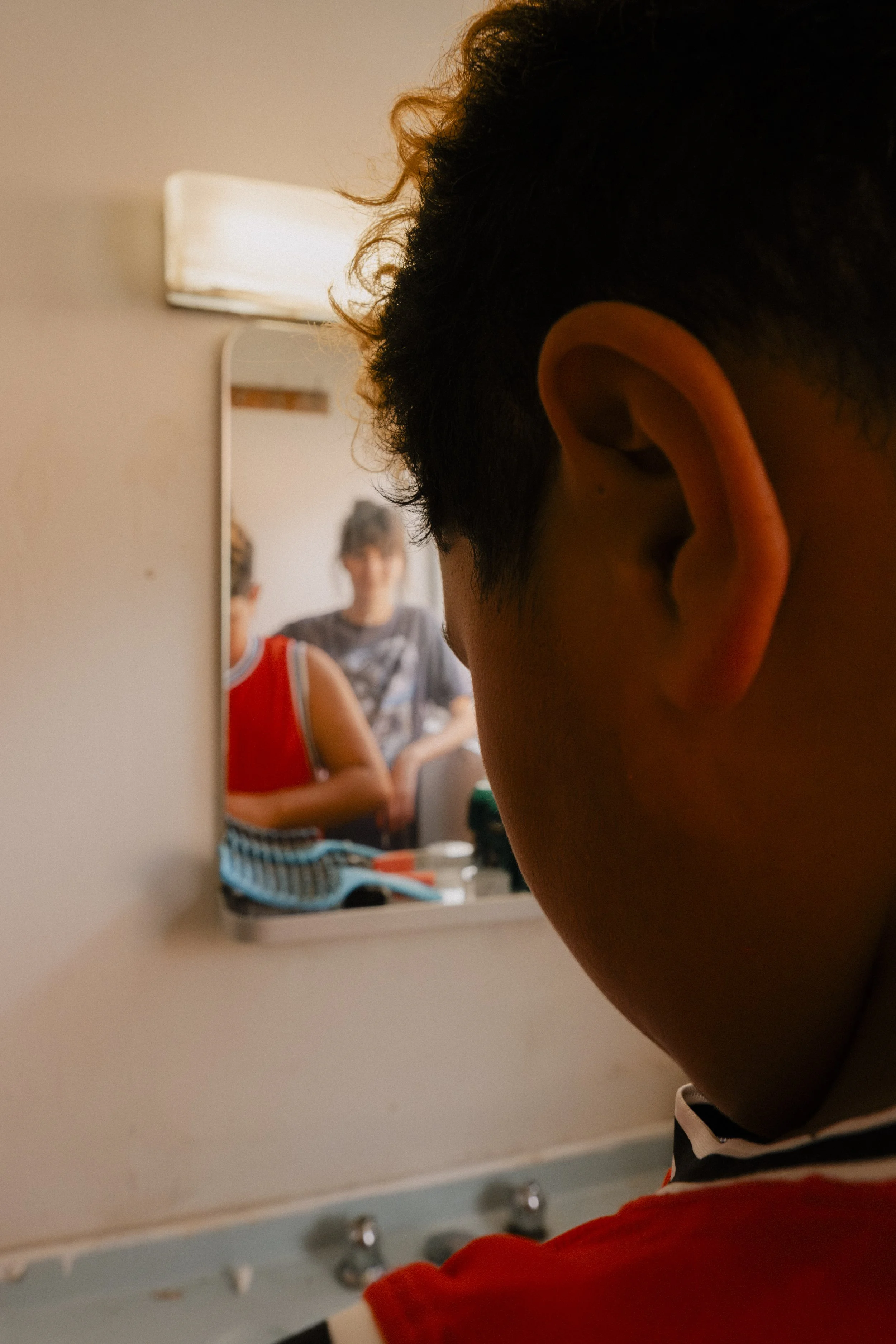 A close-up of a young boy's face, unit still from the short film Stranger Brother.