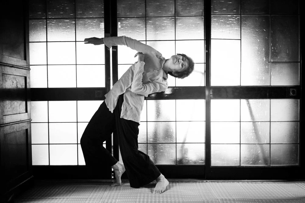 Boundary choreographed and performed by Mari Osanai ( Japan) - 50 minutes Mari Osanai was born in Aomori (north top of main Island in Japan) Japan. She was trained in Classical Ballet and Modern dance at an early age and later studied jazz dance Tai Chi and Noguchi Taiso. Noguchi Taiso and its philosophy and theory had a great influence on her creations. Her unique and complex movements are created interweaving these techniques as well as taking classes with Mr. Hironobu Oikawa. Mari Osanai's dance works have also been heavily influenced by an early exposure to Butoh in Japan in the 1980's and 90's.