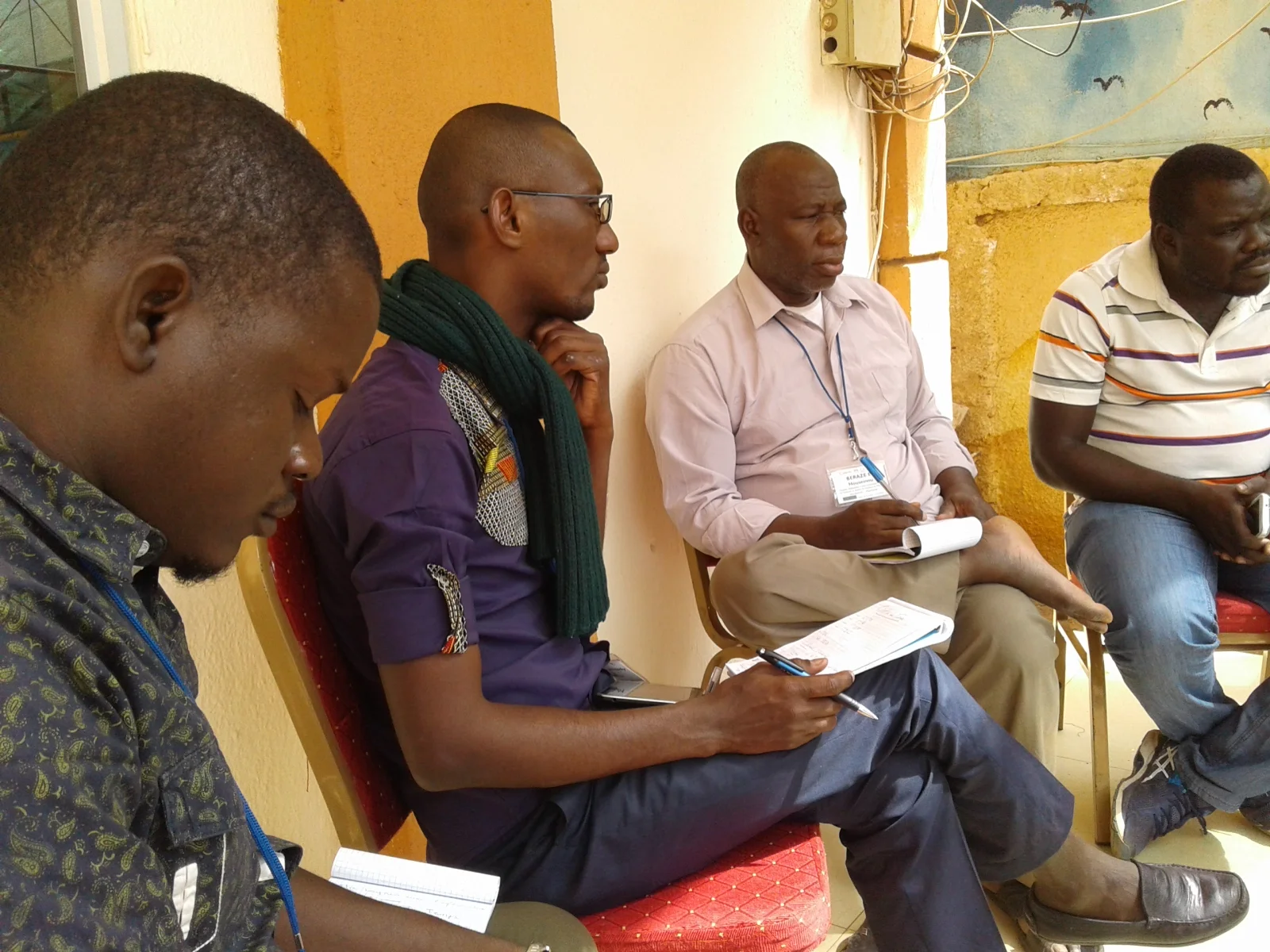 Fellows sharing experiences and ideas in small group discussions