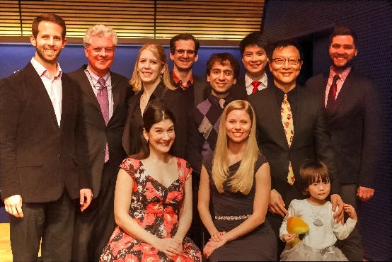 Left to right: (back row) Shea Owens, Michael Barrett, Leann Osterkamp, Matthew Tommasini, Imam Habibi, Mingei Lei, Bright Sheng & Brandon Scott Rumsey (seated) Annie Rosen, Amy Owens, child not identified
