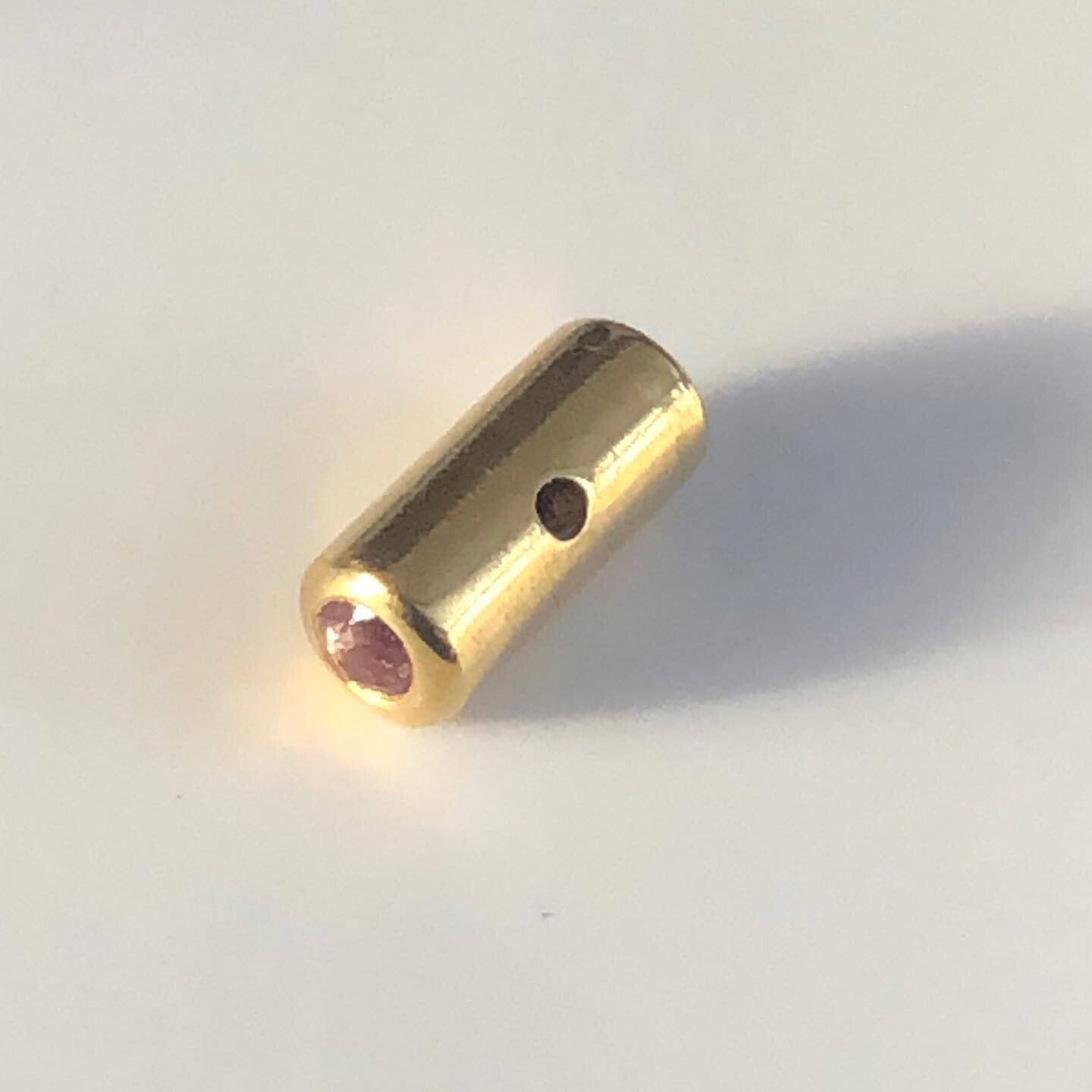 Having fun in the workshop. Working on parts for a knock out bracelet. Student setting 2mm round, faceted sapphires at each end of a 3.5mm wide, solid, 22 karat gold bead #goldbraclet #22karatgold #22karatgoldjewelry #22karatjewellery #gold #workshop