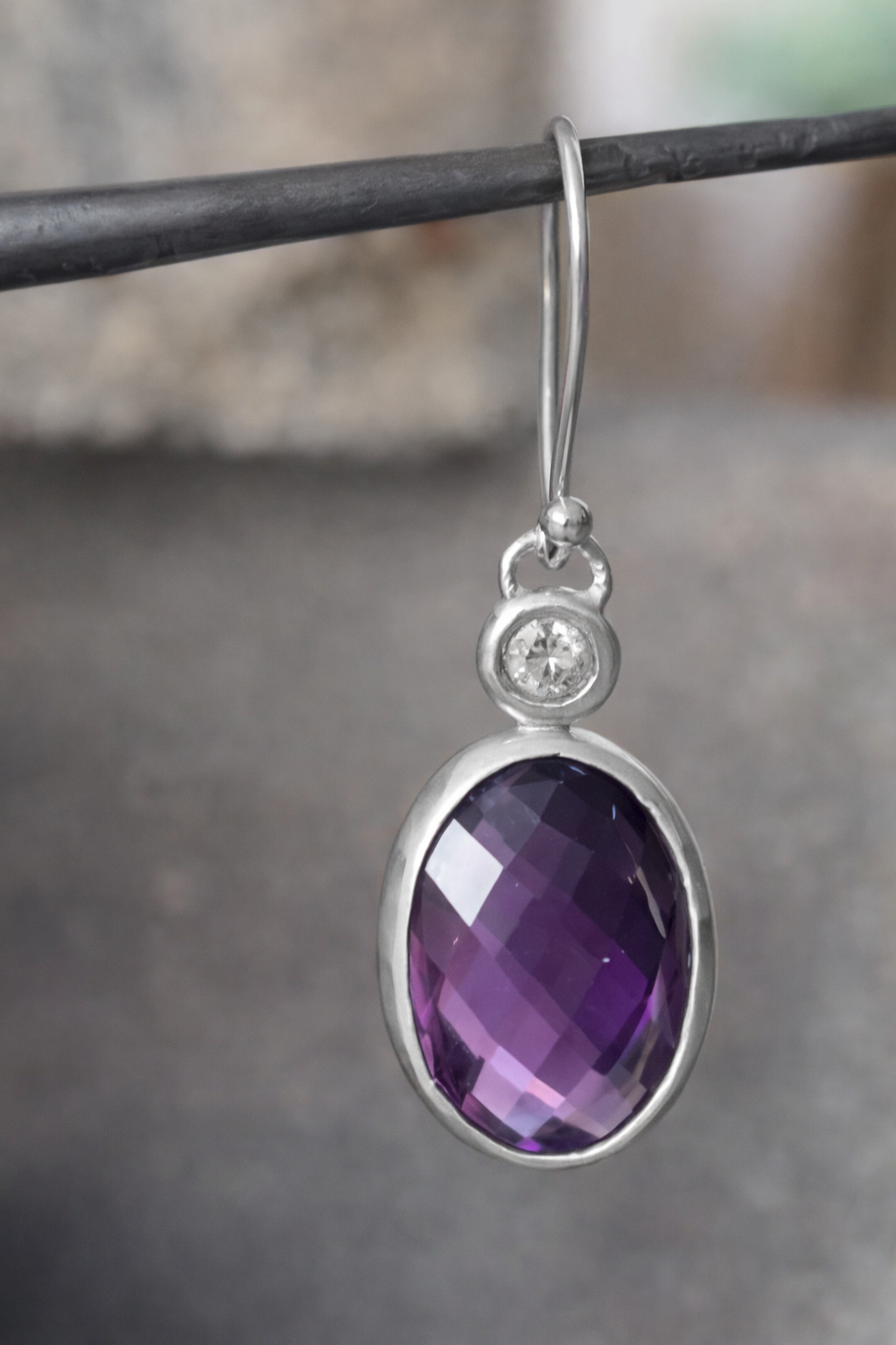 Sterling silver amethyst earring close-up.png
