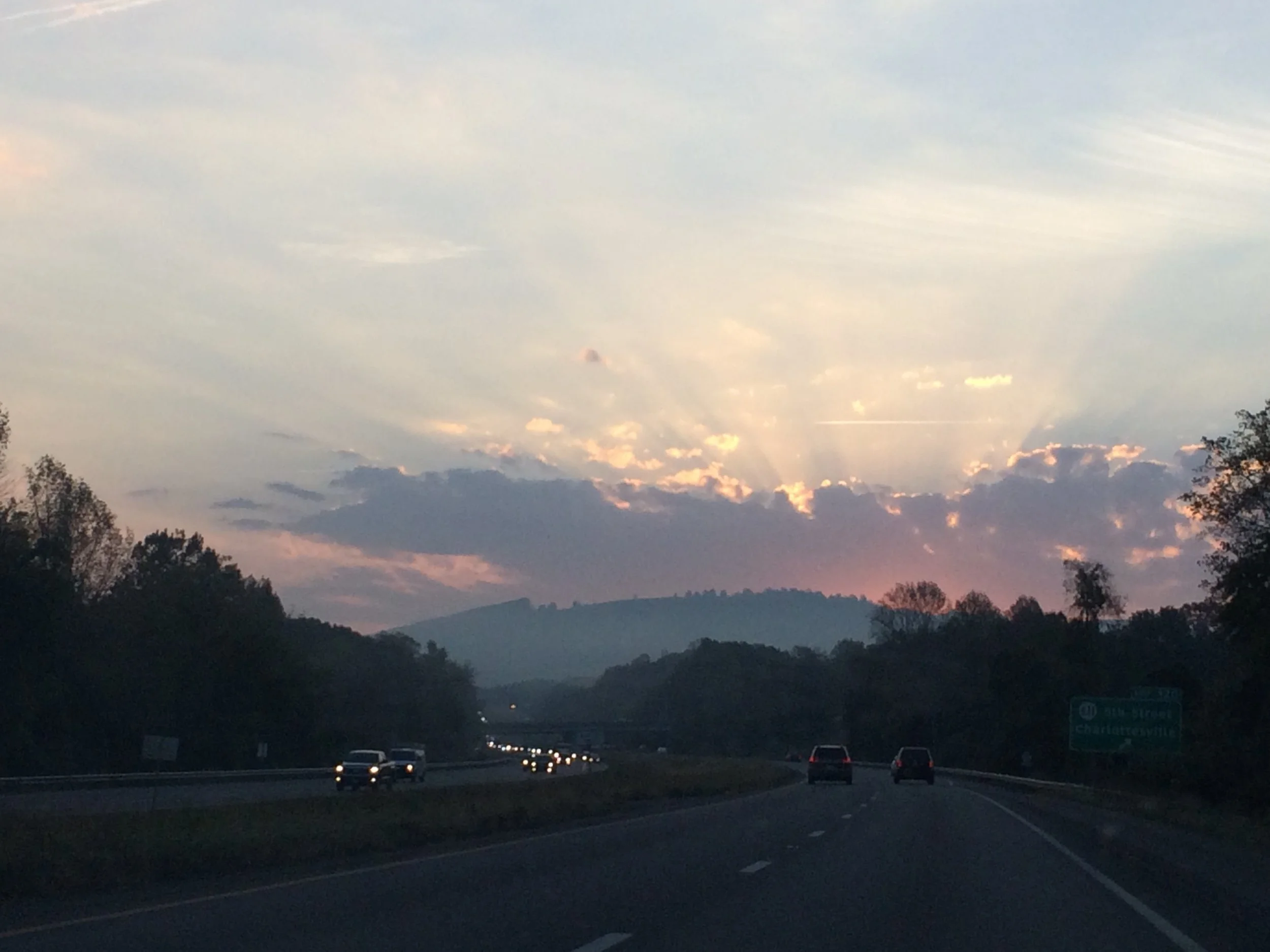 The sky one morning, worth embarrassing my daughter into taking this picture.