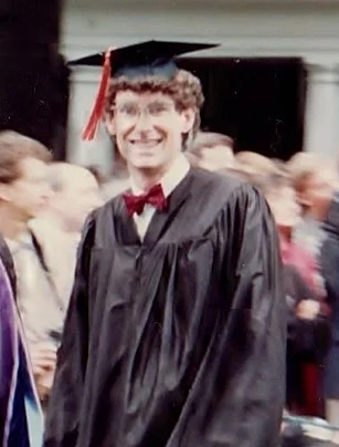 Jeremy, walking down the Lawn on graduation day.