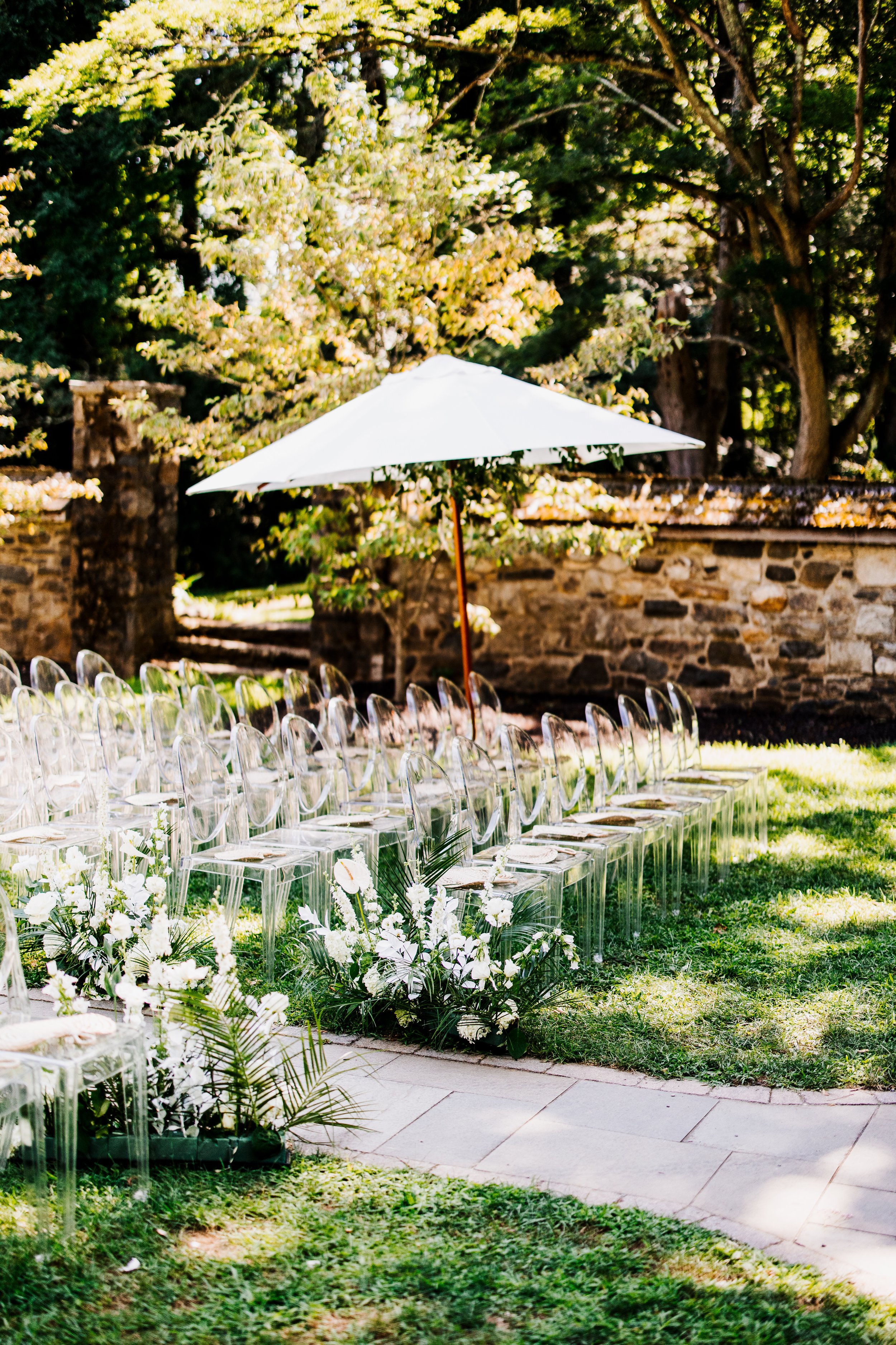 parque-wedding-ceremony-ghost-chairs.jpg