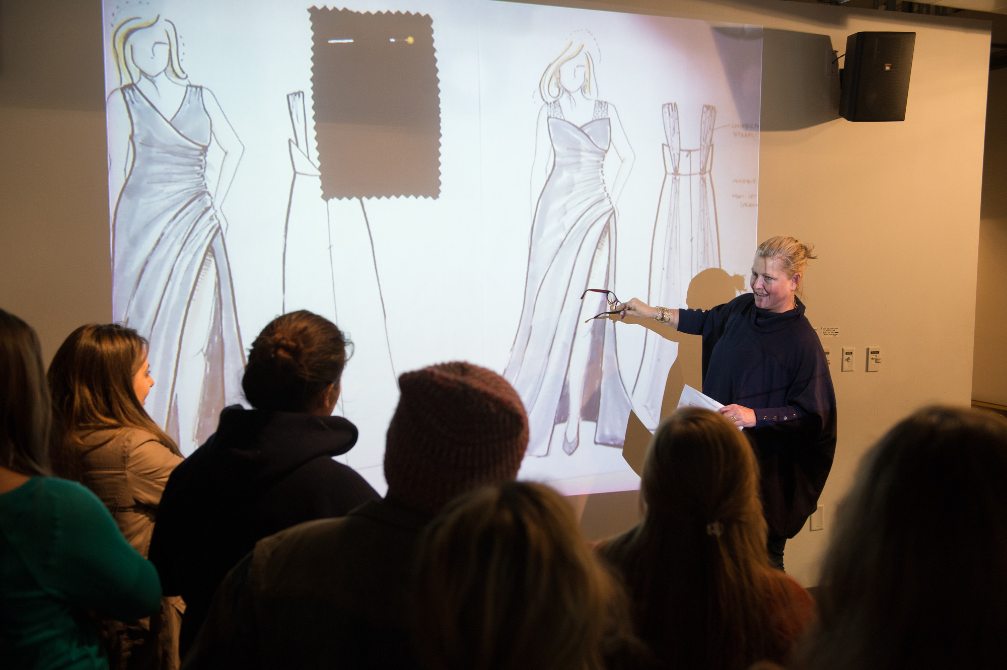 Supermodel Emme speaking with Syracuse University students at a Fashion without Limits clothing line sketch unveiling.