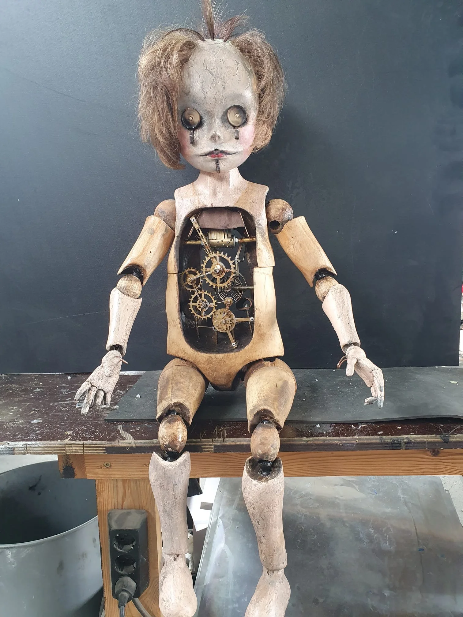 Moving prop make of the Child like lure used in the Horror movie