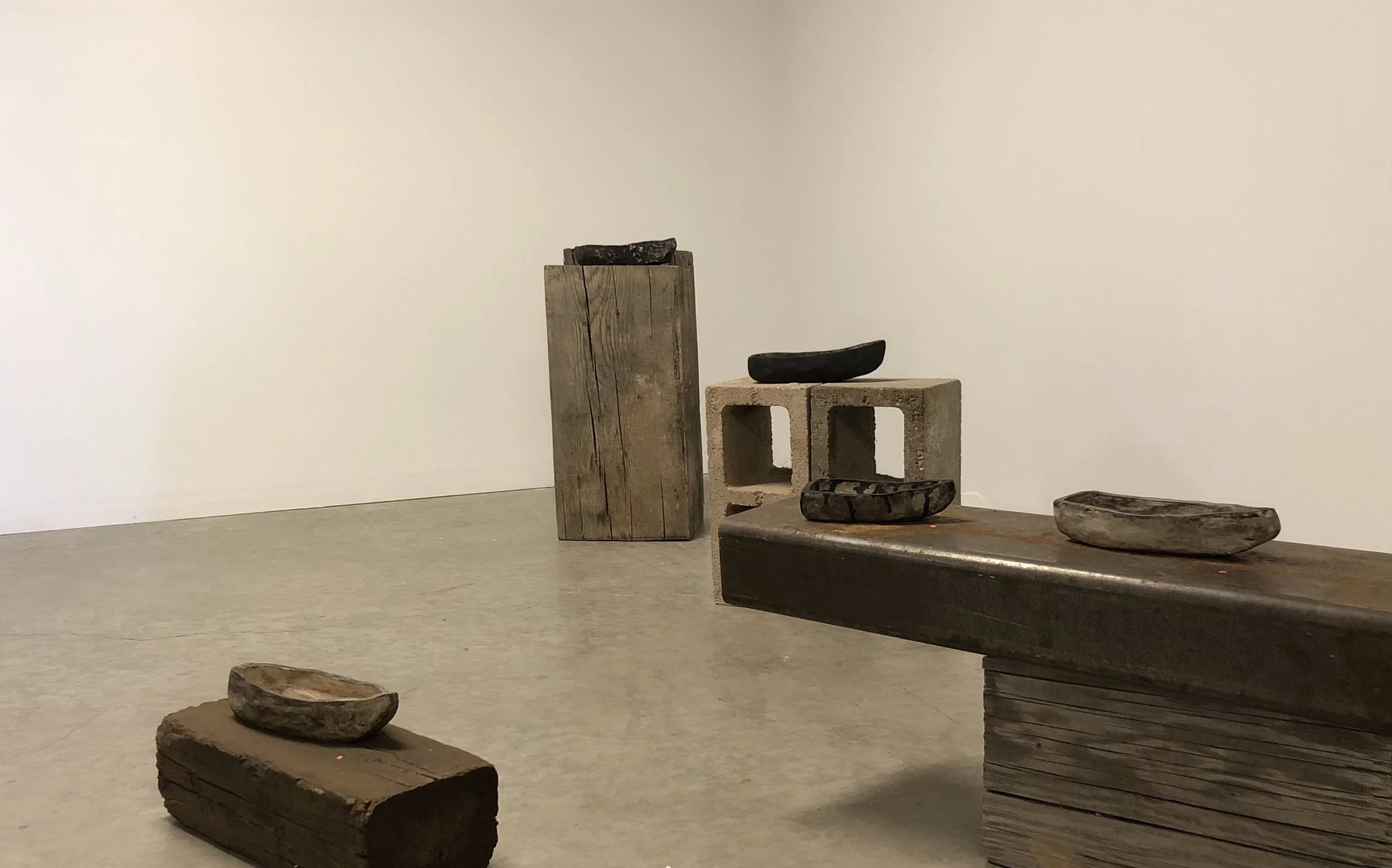  Ilona Pachler In her command sailed 34 black hollow vessels Clay, graphite, pigment, ink, wood, steel, concrete Sizes ranging from 4 ½ x 1 ½ x 1 to 11 ½ x 4 x 2 ¼ inches 2018 