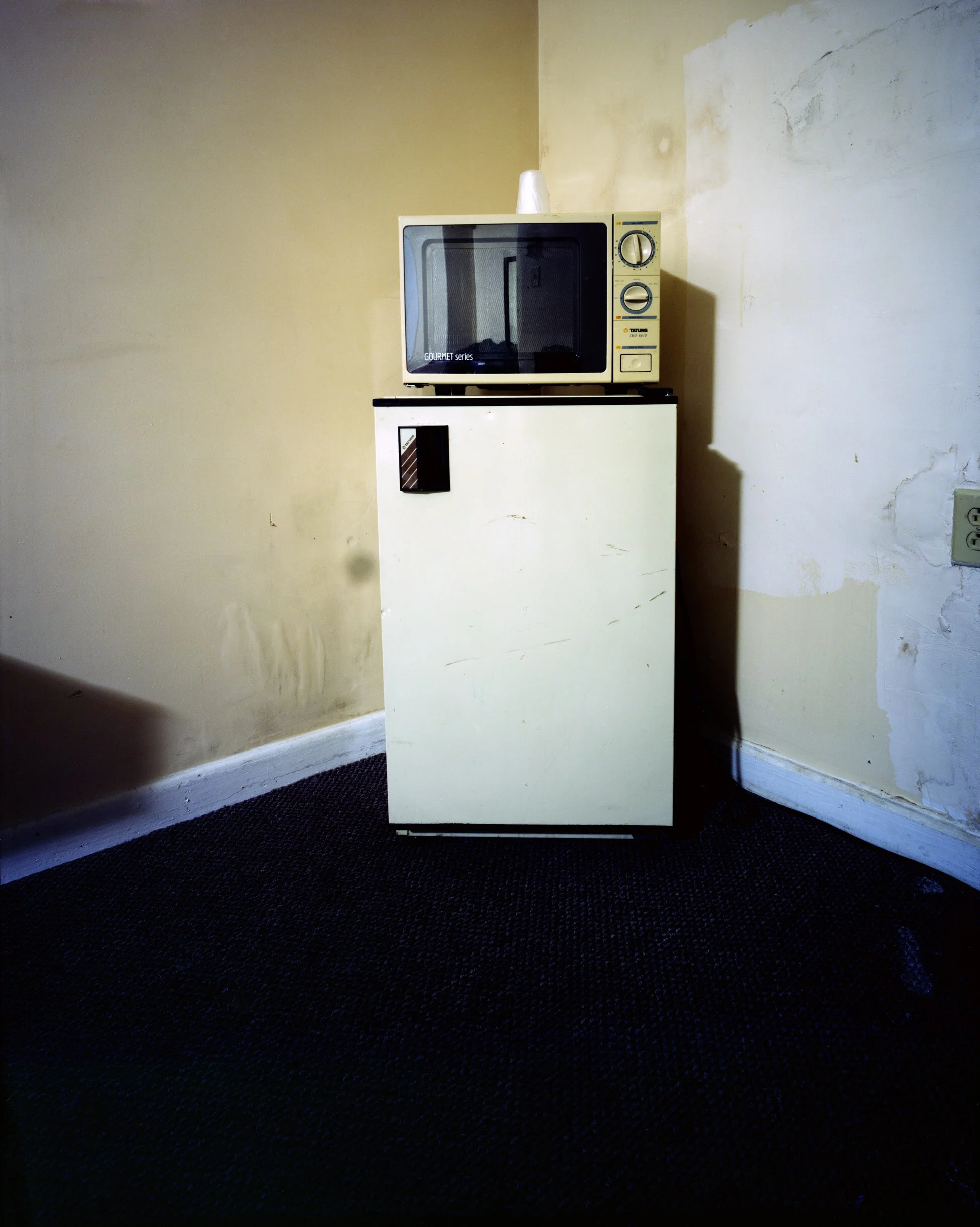  Eric Cousineau Mini-fridge, Room 112 1 / 20 From American Motel Archival pigment print 17 x 22 inches 2010    