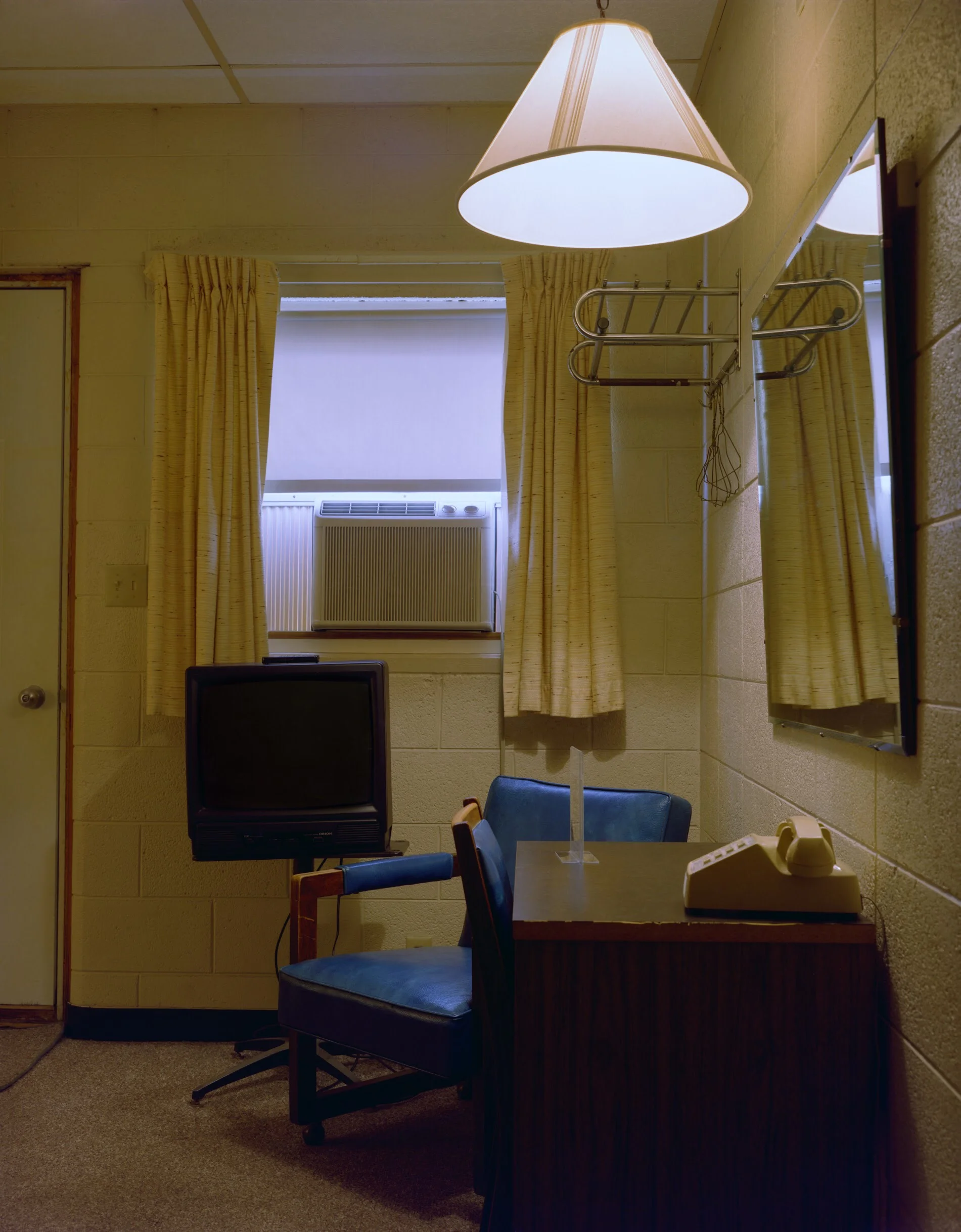  Eric Cousineau Two blue chairs, Room 23 1 / 20 From American Motel Archival pigment print 17 x 22 inches 2011    