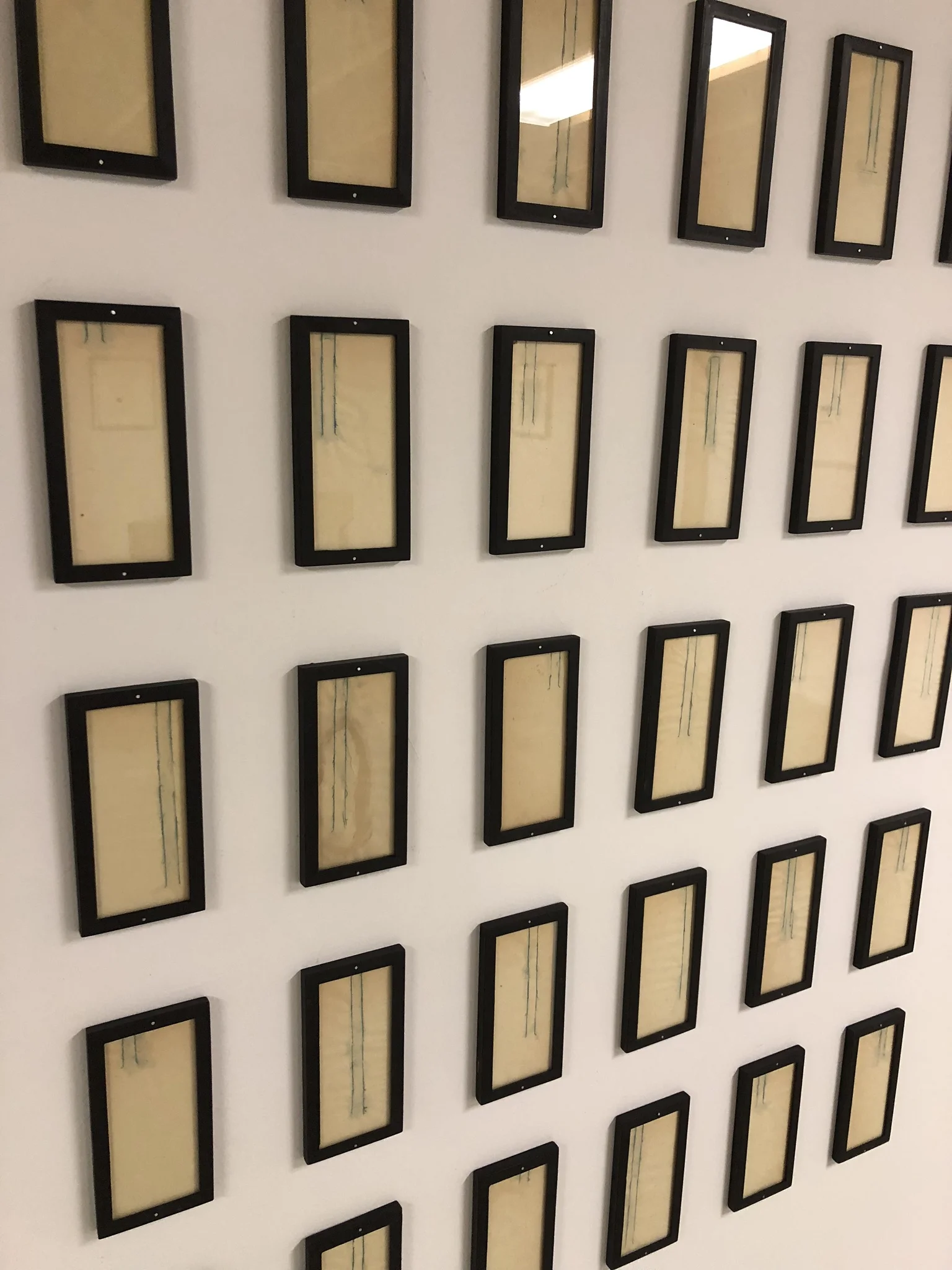  Wes Mills Mondrians Forest 40 individual framed pieces (each 6 ¼ x 3 ⅛ inches) Ink, graphite on paper 2002    