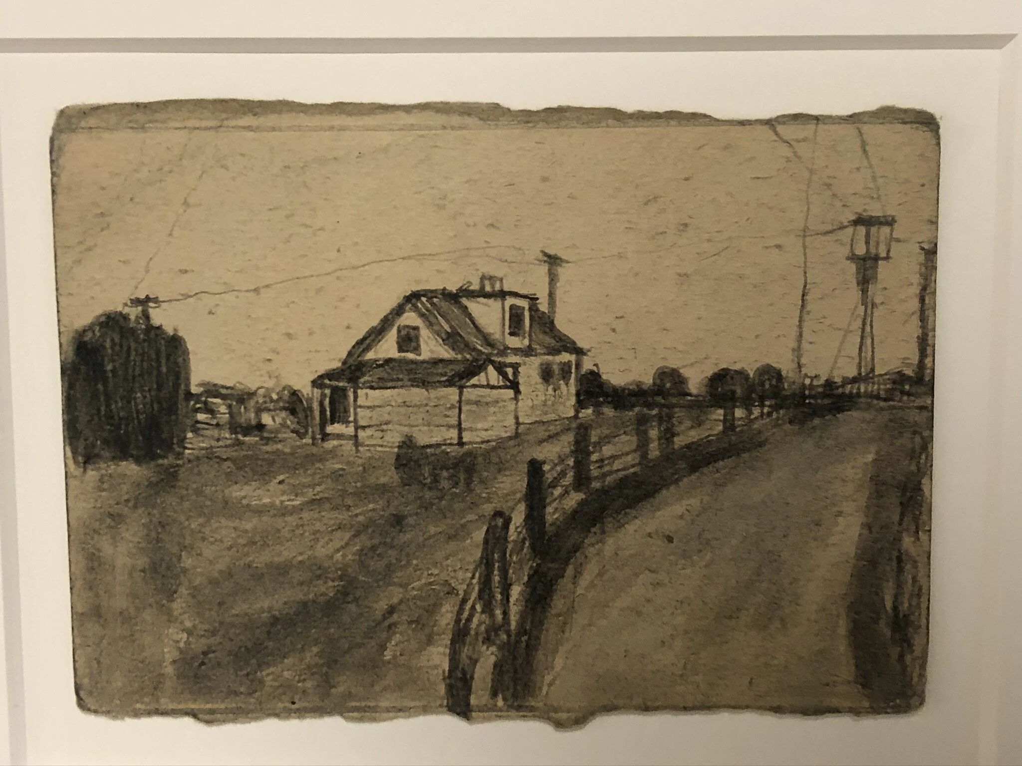 James Castle  Untitled (landscape with house)   n.d.  Soot and spit on found paper, double sided   5 ½ x 7 ¾ inches  