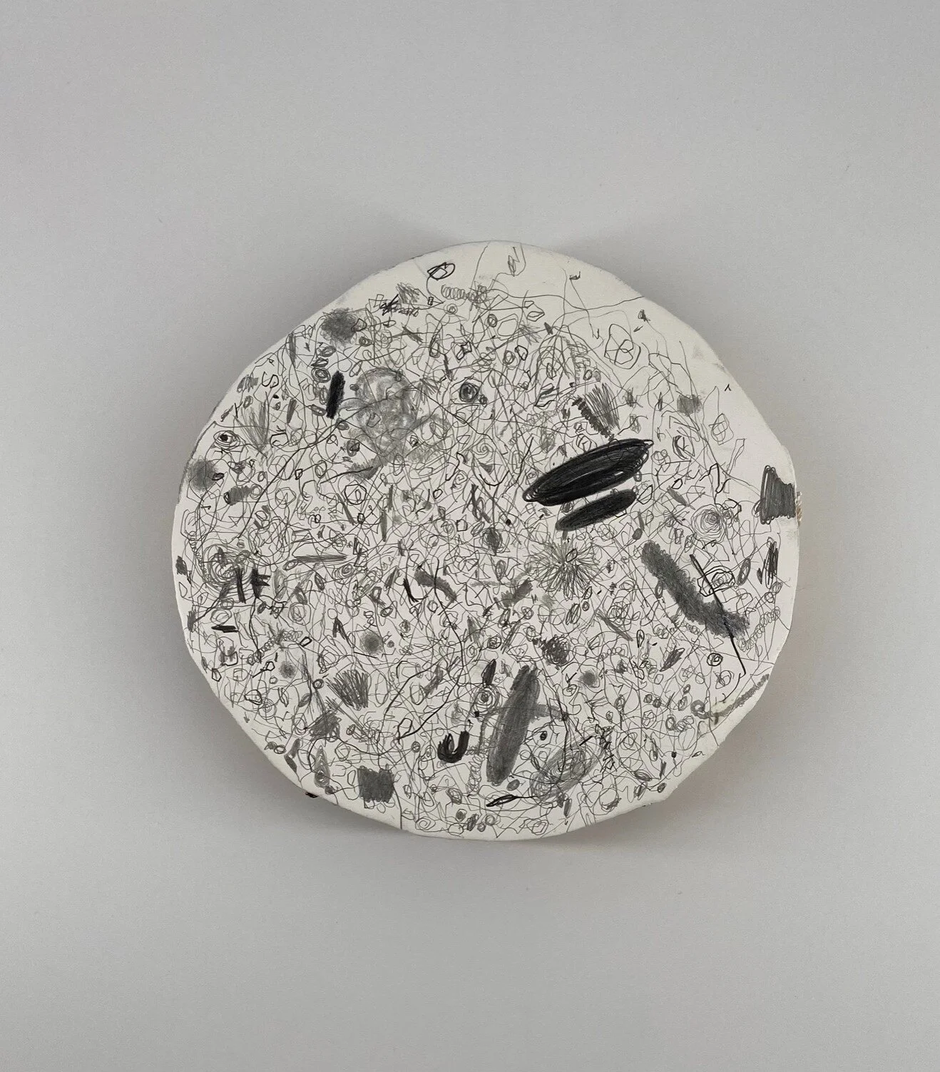  Wes Mills ”firmament” -2 2020 Approx. 6 inches round x 1 inch deep  Graphite painted panel 