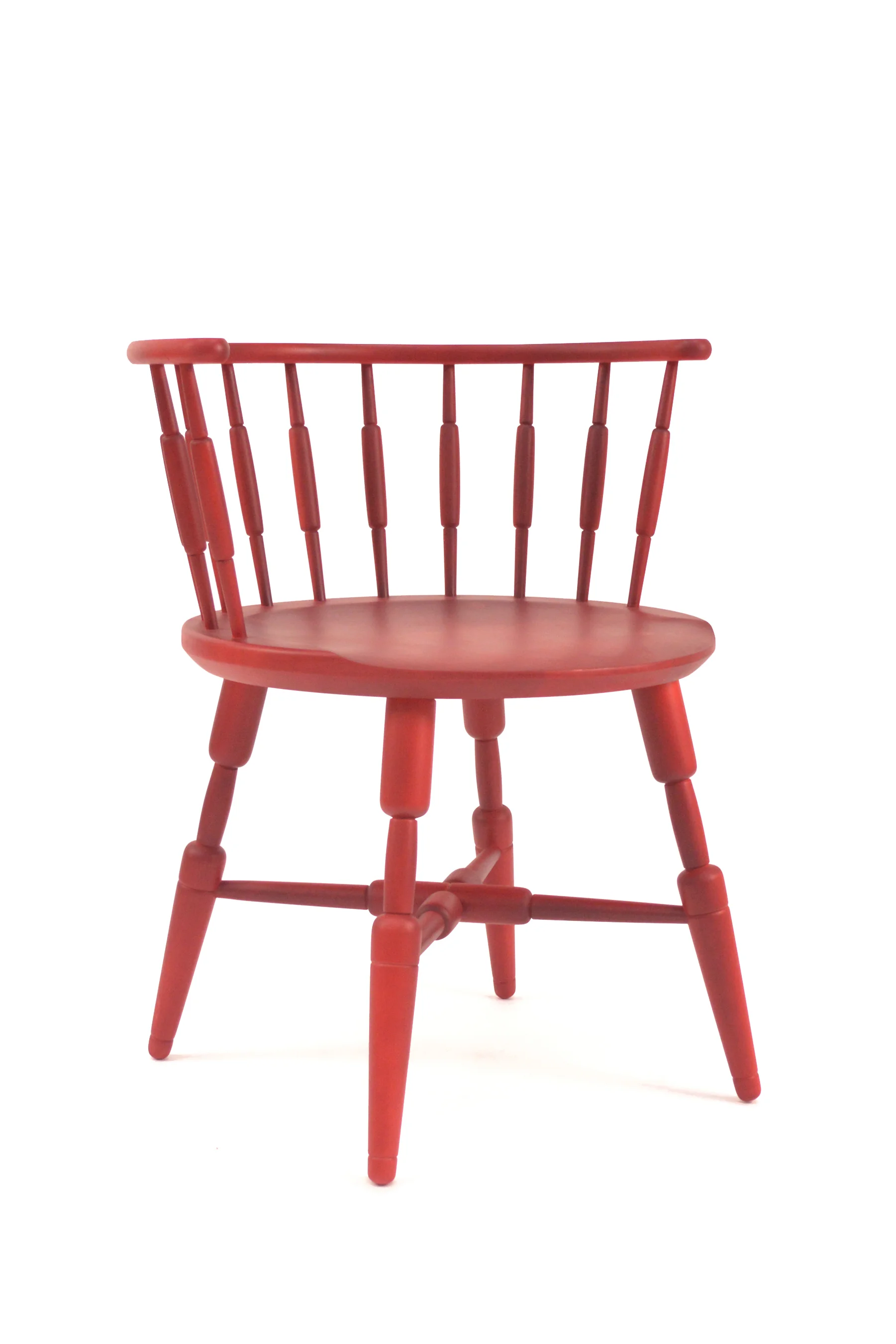 Sausage Link Chair is a take on a traditional low back windsor chair. The spindles and seat are manipulated to appear soft and malleable, such as the transitioning fleshy weight seen in sausage links. Materials: Dyed Hard Maple H 29” x L 22” x W 24”