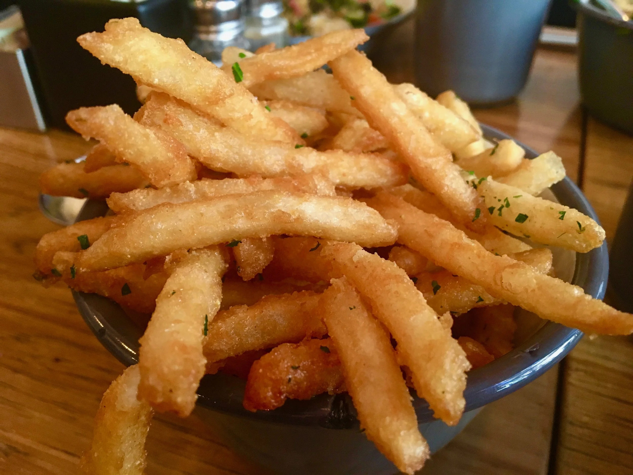 What: Crispy Chicken Schnitzel Salad, Crispy Rice Bowl, Lamb Ragu, & French Fries with Truffle Aioli