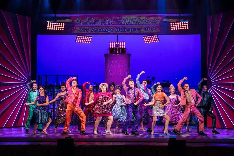 An ensemble scene from Hairspray, playing Bristol Hippodrome from March 5-10