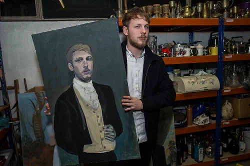 Actor Tim Hawken with his Wickham portrait Photo by Paul Johnson