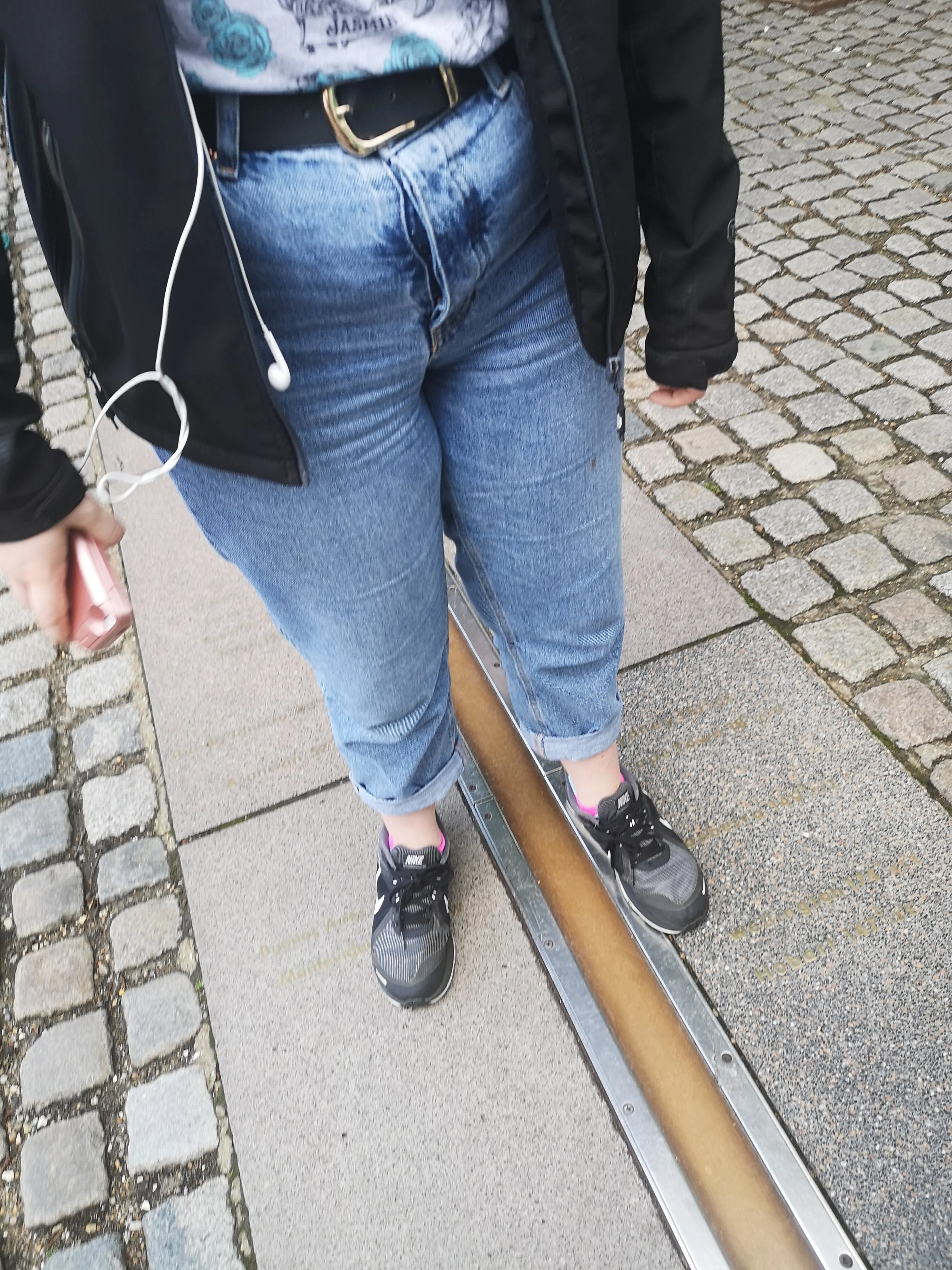 Selfie time for Seren on the Meridian Line, an attraction at The Royal Observatory. Photo: Rachel Howells.