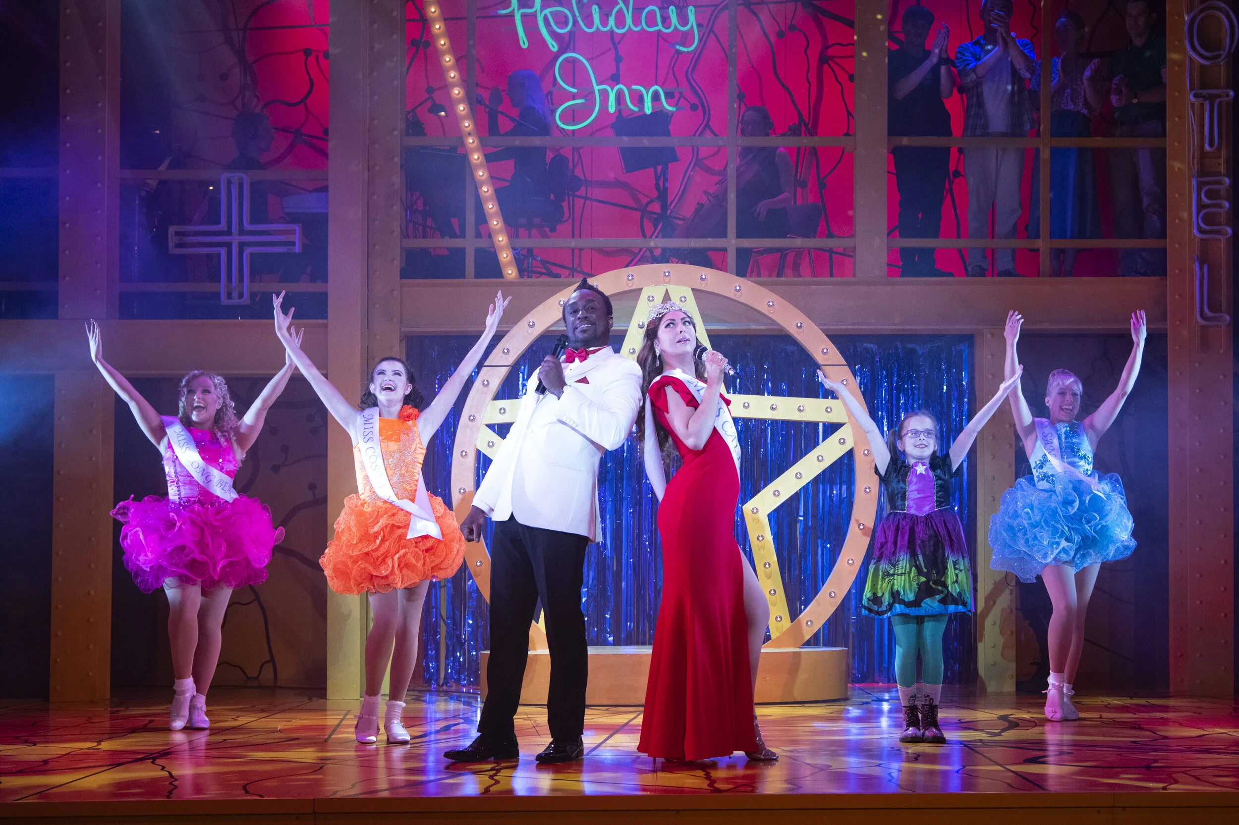 Ian Carlyle as Buddy, Imelda Warren-Green as Miss California, Evie Gibson as Olive with the Mean Girls in Little Miss Sunshine which plays at Cardiff’s New Theatre until September 14, 2019 Picture: Richard H Smith