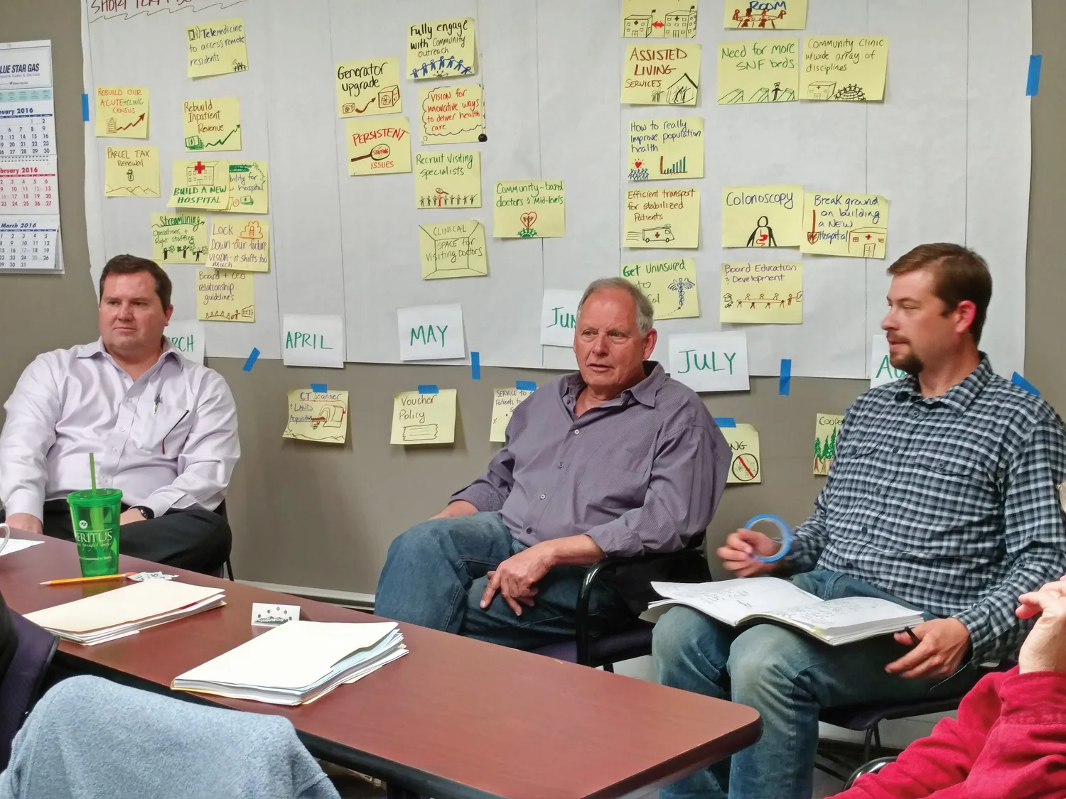 Southern Humboldt Community Healthcare District CEO Matt Rees, left, meets with Rob Eskridge and Ryan Stock of Growth Management Center, the consultants helping to update the district’s strategic plan. (Photo by Kent Scown)