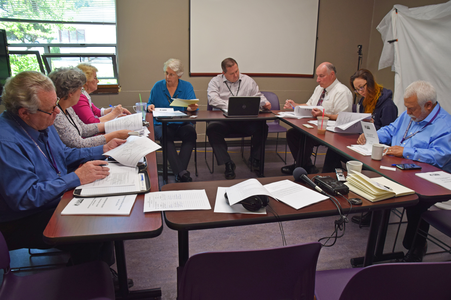 The Southern Humboldt Community Healthcare District board meeting was attended by, from left, board members Gary Wellborn and Corinne Stromstad, administrative assistant Susan Gardner, board president Barbara Truitt, district CEO Matt Rees, district CFO Paul Eves, and board members Alison Rivas and David Ordoñez.