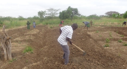 Preparing soil to receive seed and preparing hearts to receive God's Word ~ Kenya
