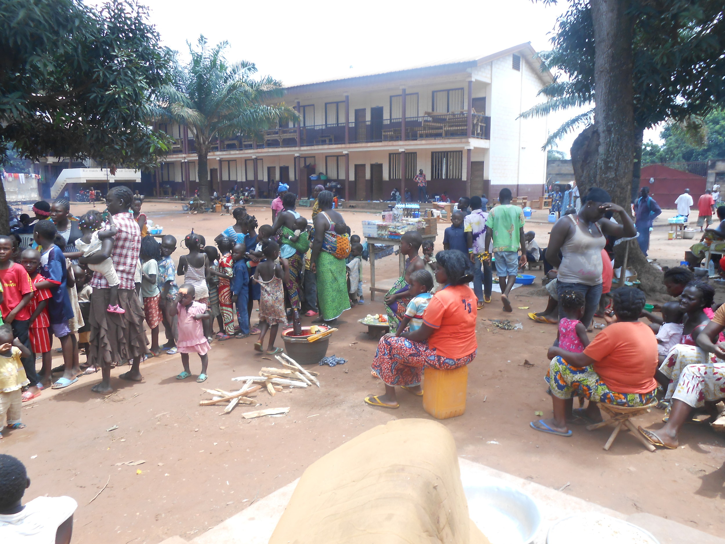 Feeding at IDP camp at School.JPG