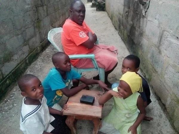 Mr. Mkude and His Grandchildren Around Proclaimer – Tanzania