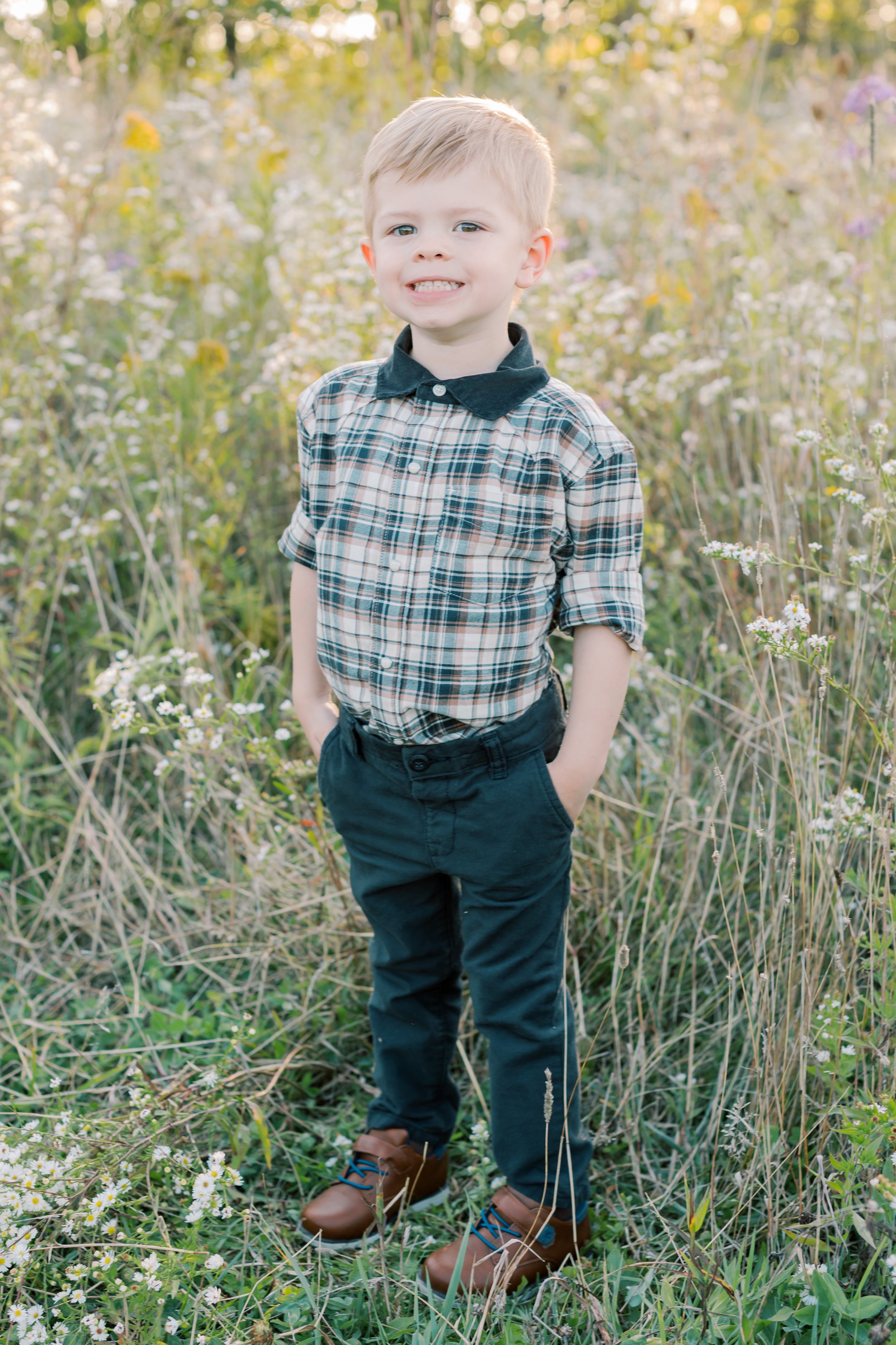 A family enjoying the sunset during a lifestyle session at Cityview Park with a top-rated family photographer in Burlington.