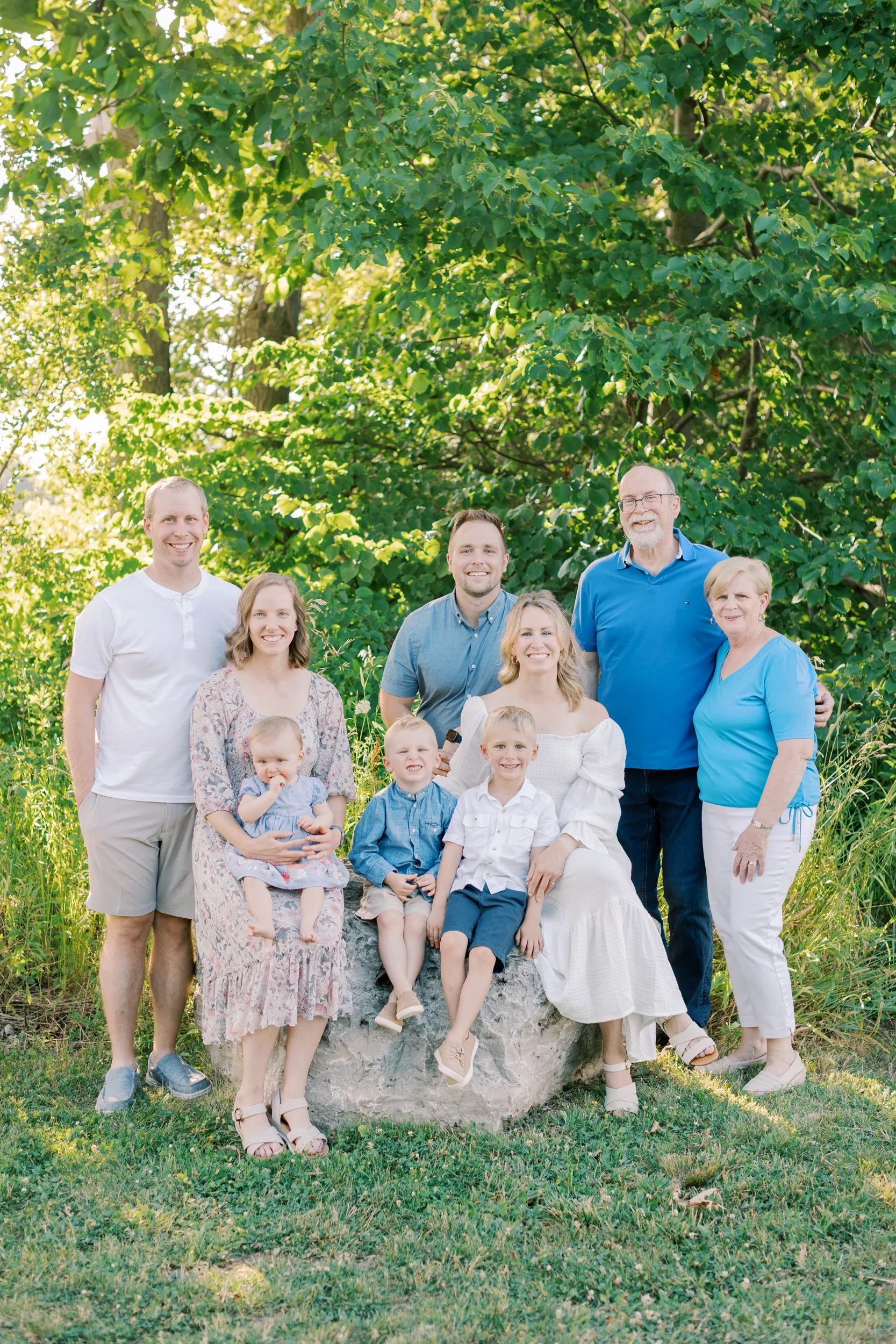 A family enjoying the sunset during a lifestyle session at Cityview Park with a top-rated family photographer in Burlington.