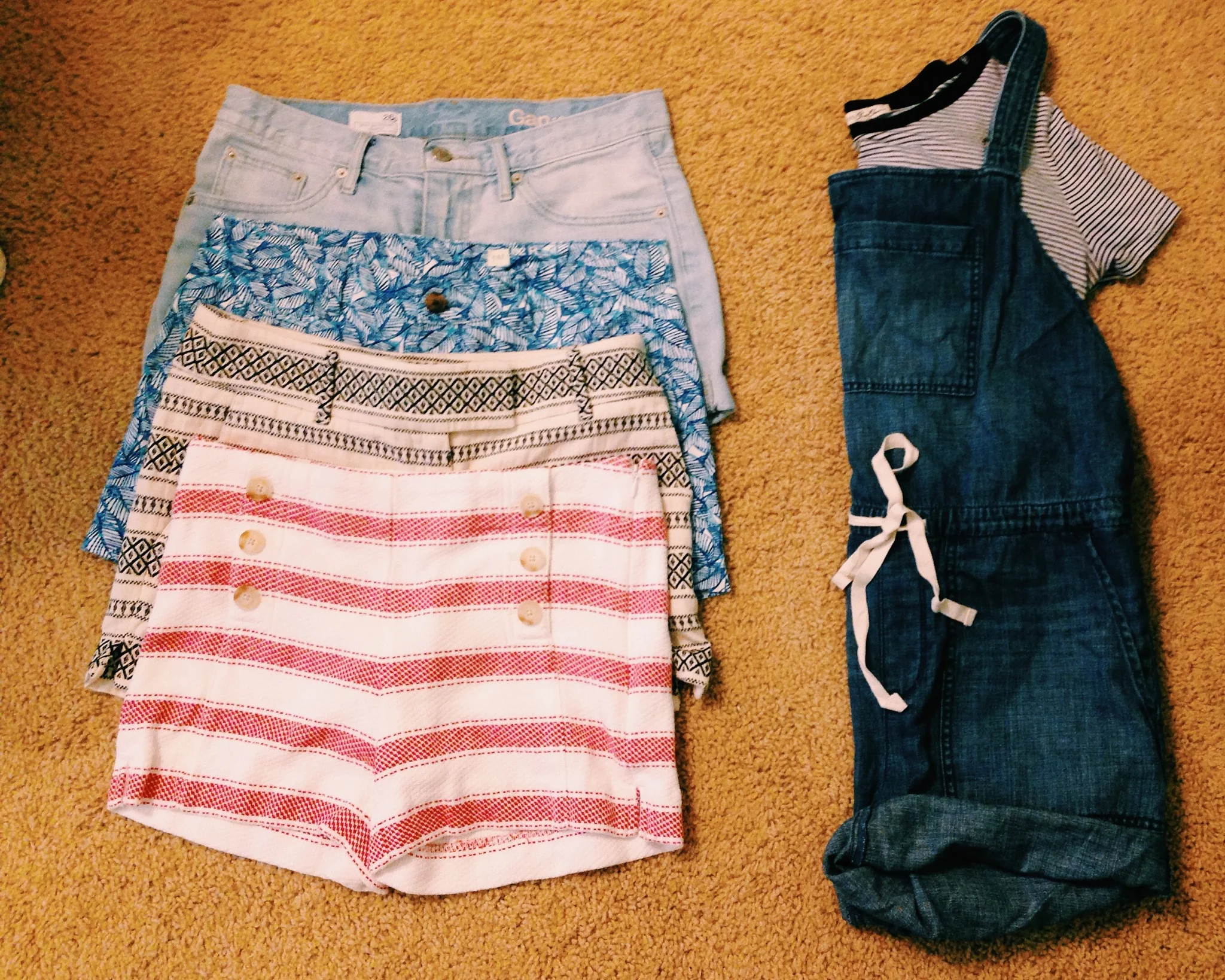 | Denim-Wash Shorts: GAP | Palm-Patterned Shorts: GAP | Tribal-Striped Shorts: LOFT (ON SALE NOW) | Striped Double-Buttoned Shorts: LOFT (ON SALE NOW) | Shortalls: LOFT, sold out, similar here | | Striped Crop Top: Express |