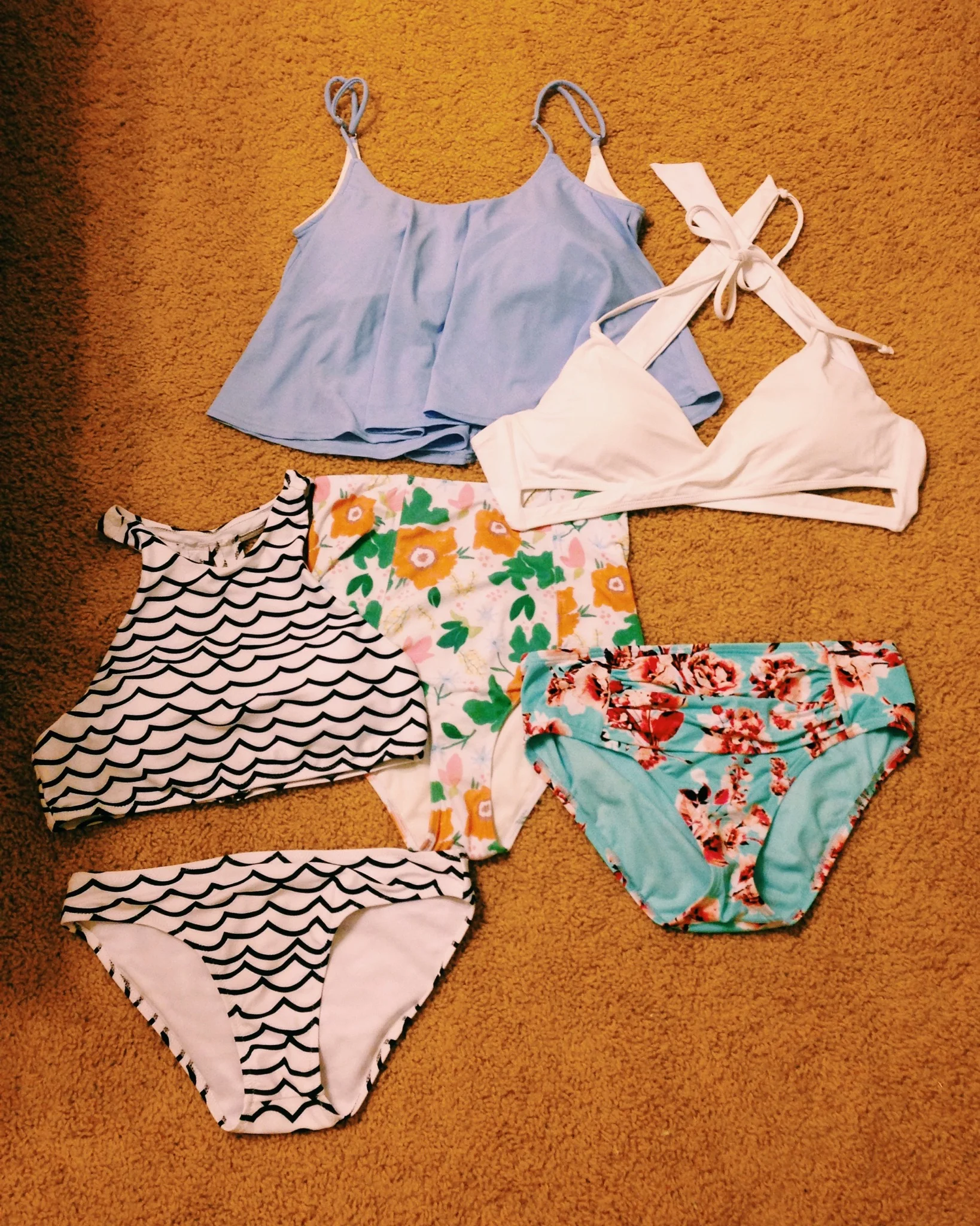 | Crossover Triangle top: Garage | Blue Floral Midi-Bottoms: Had them forever | Swing Top &amp; High-Waisted Floral Bottoms: Kortni Jeane | | 90's High-Neck Two-Piece Set: CUPSHE |