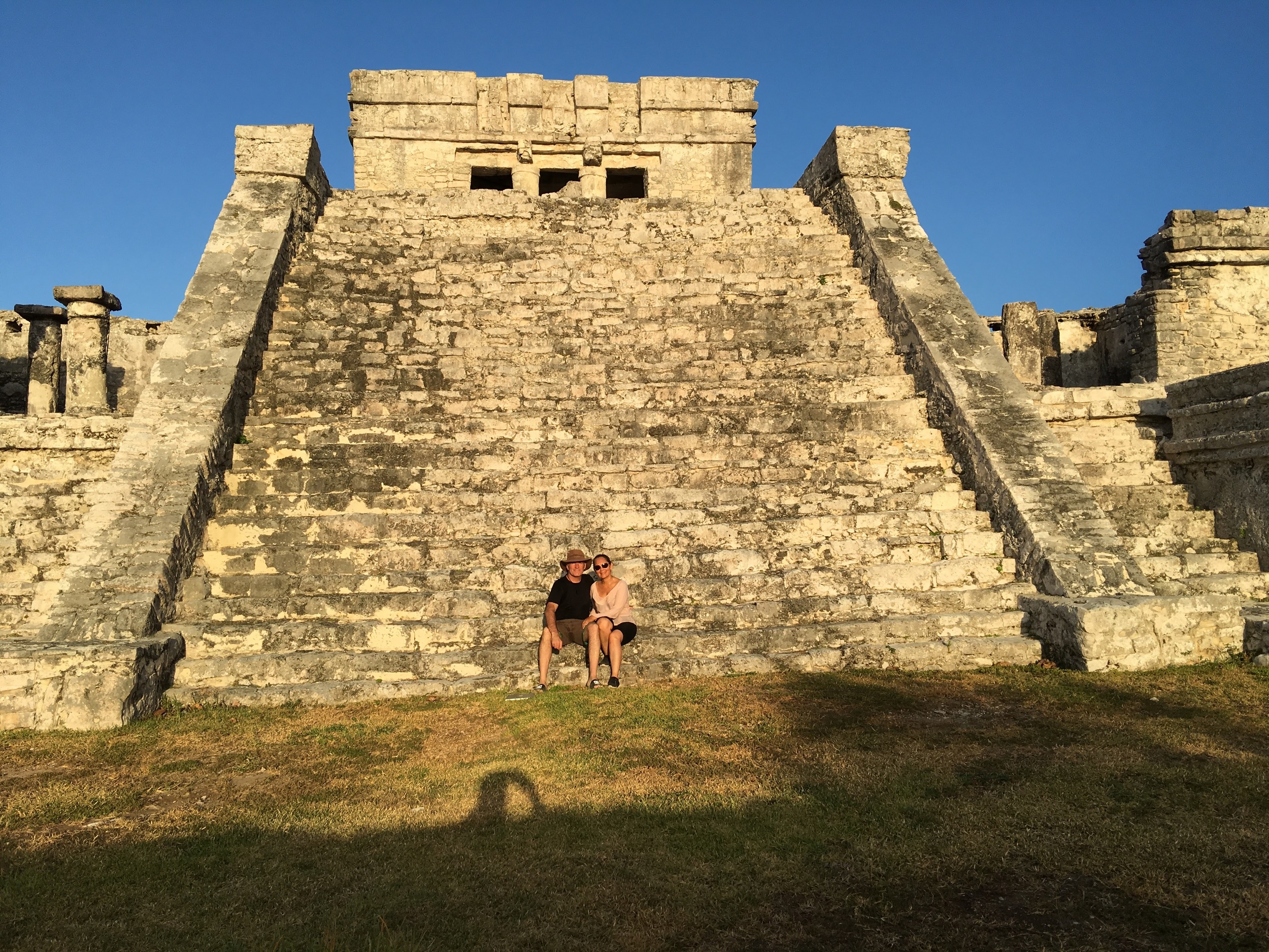 A security guard let us jump the rope and sit on the main pyramid for this photo.