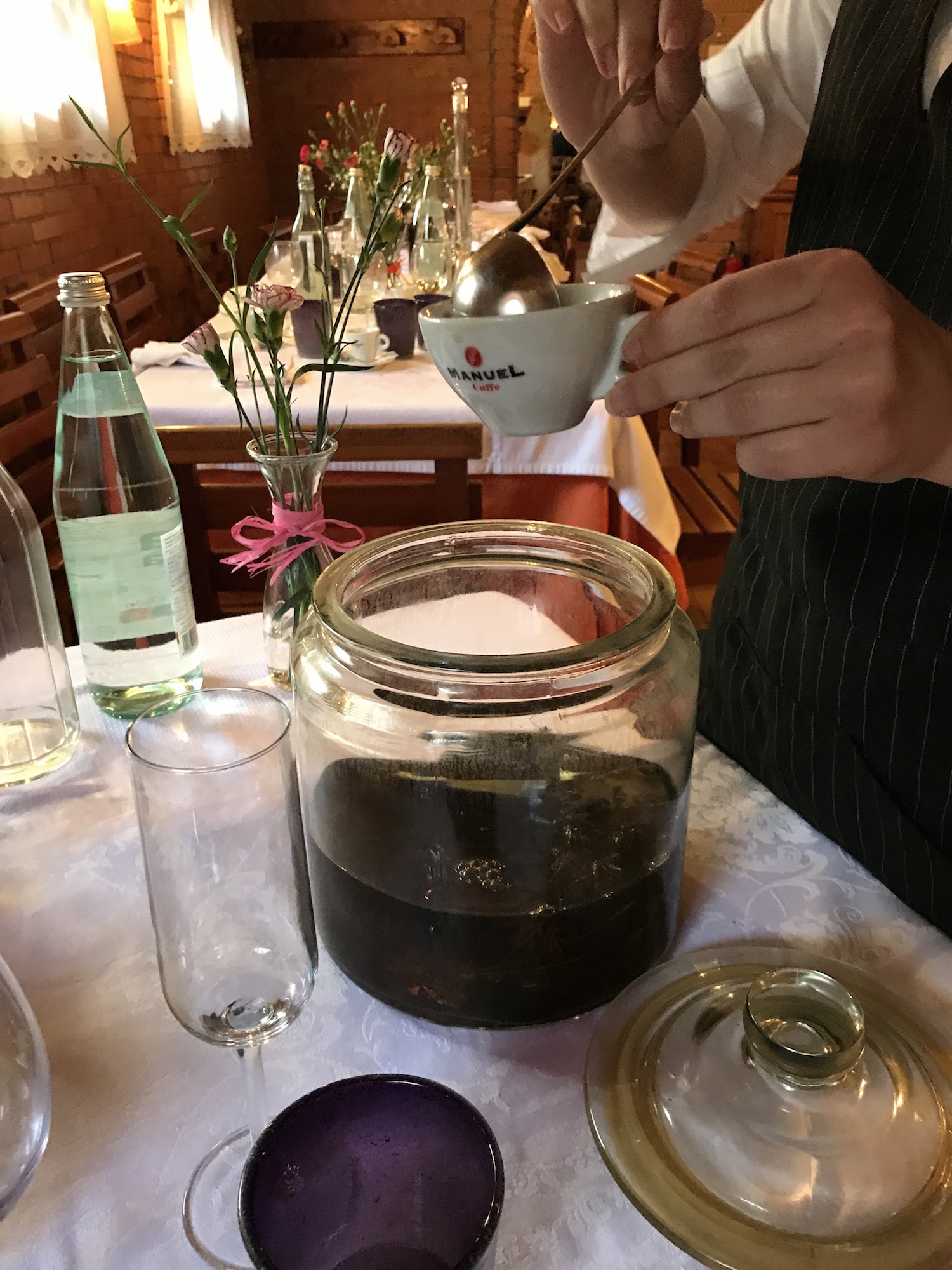 The waitress came around with several kinds of house-made grappa served in our coffee cups. 